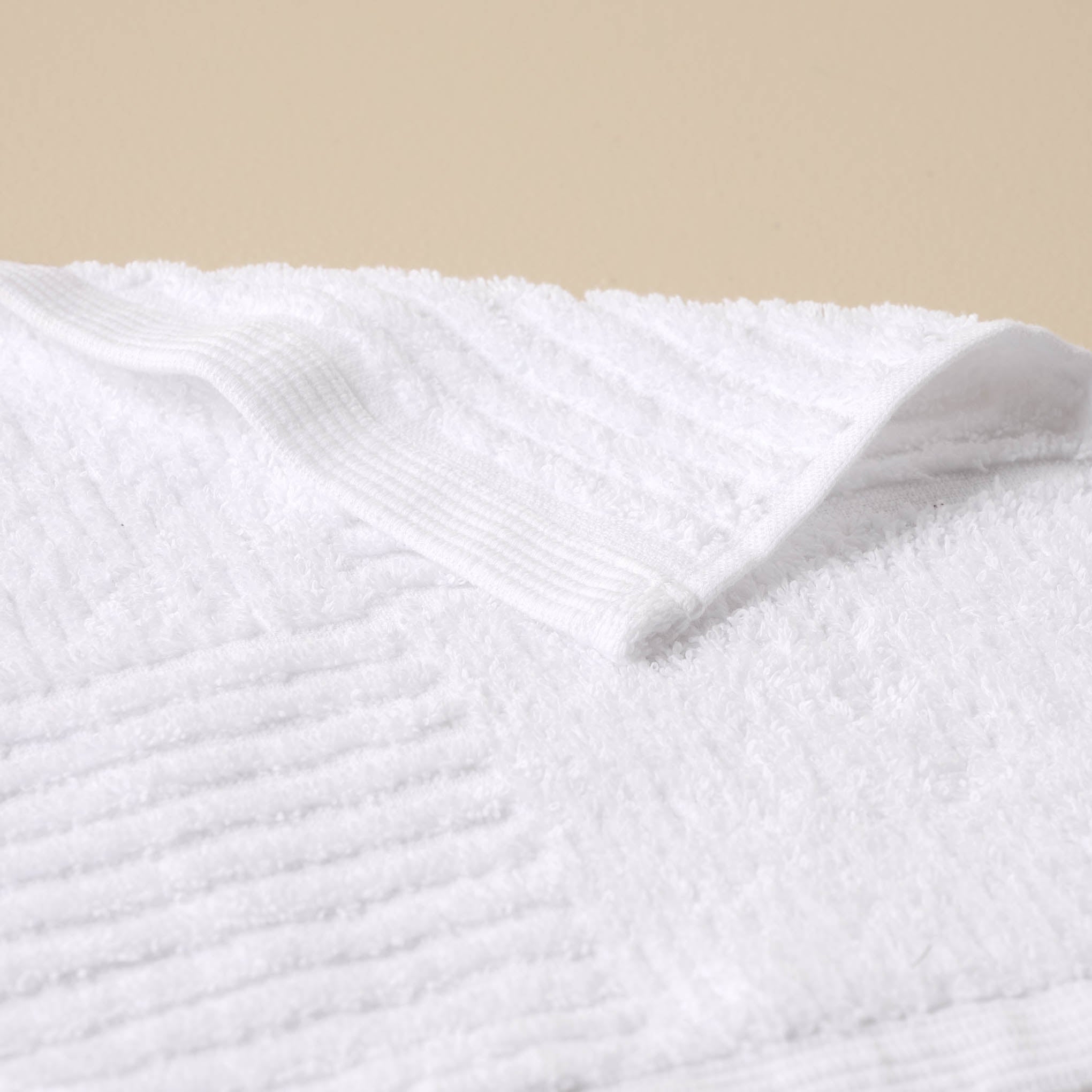 detail view of white textured bath towel