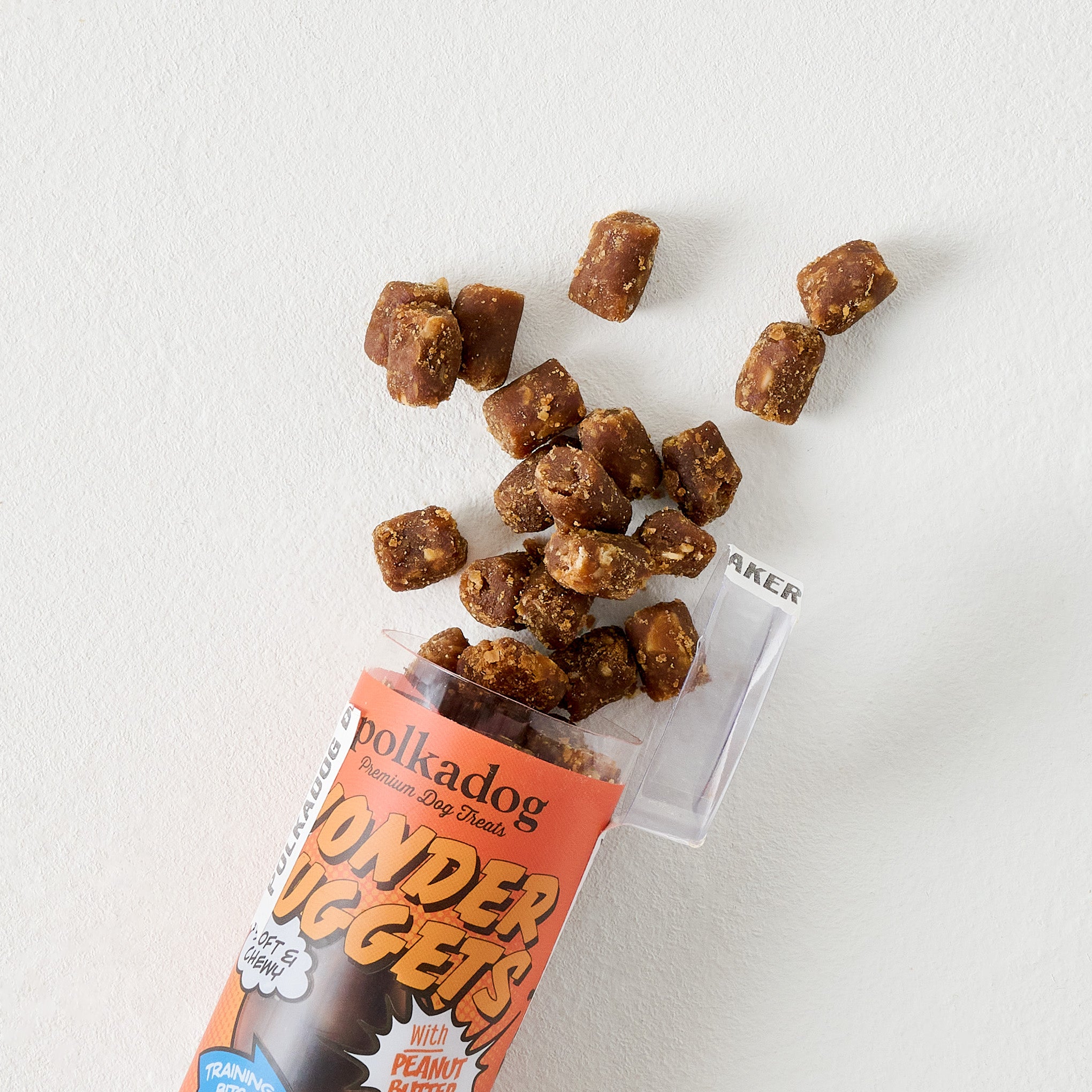 Polkadog Wonder Nuggets with Peanut Butter Treats shown spilling out of tube
