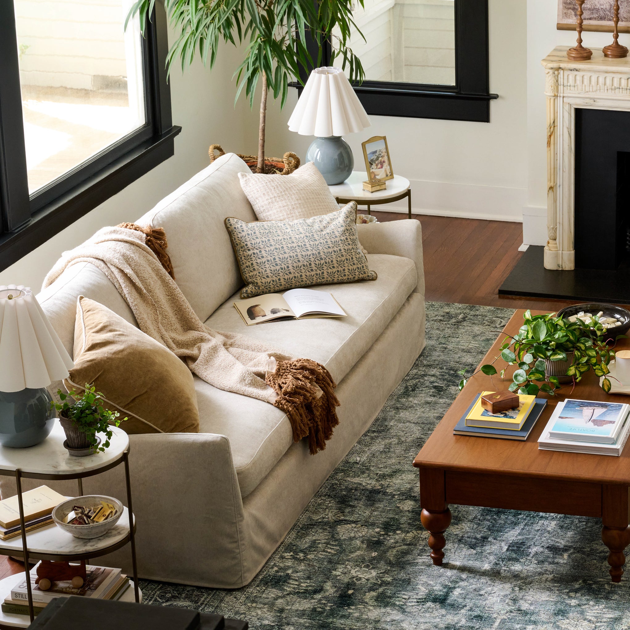 Sabine Slipcover Sofa in shell in a room