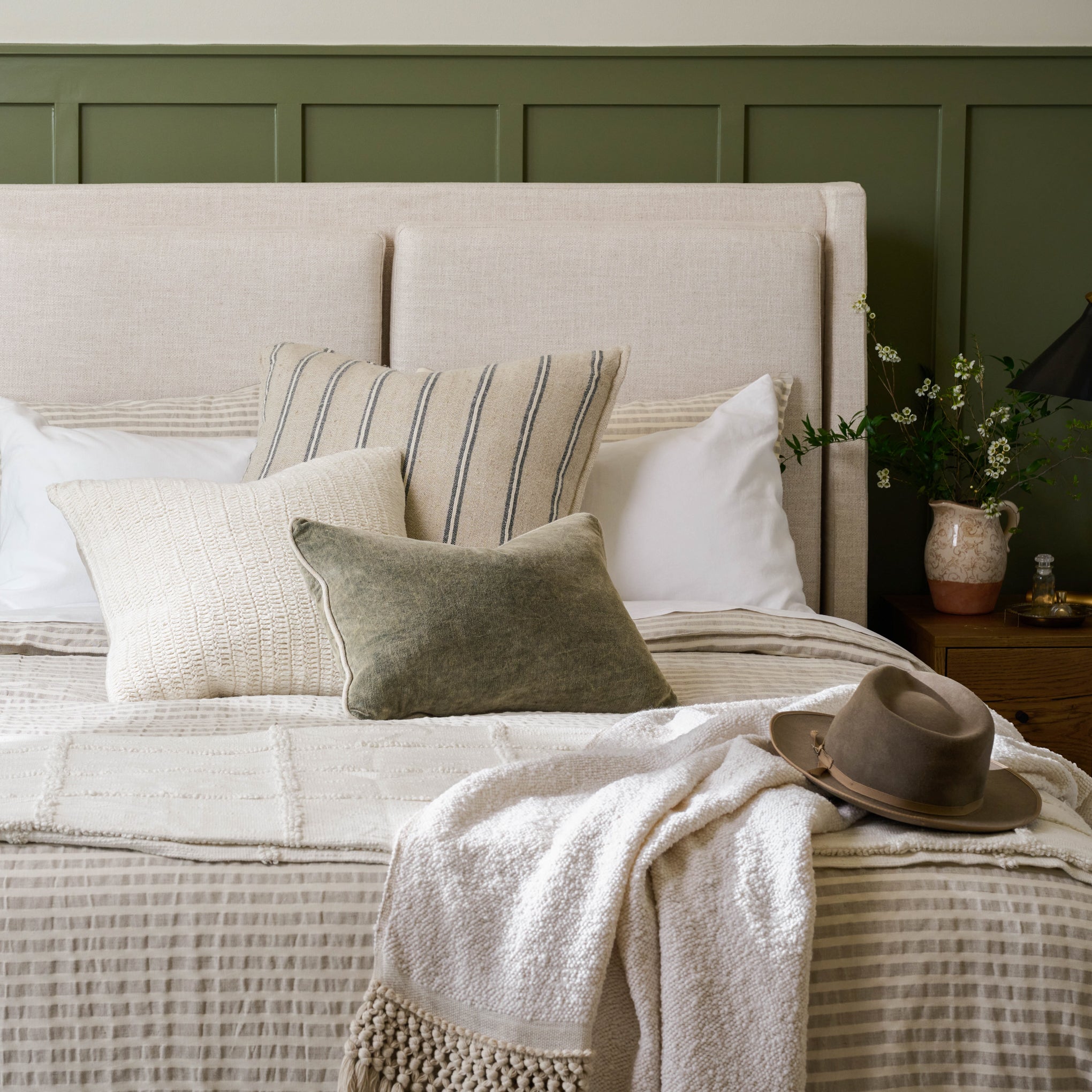 Shadow Grey + Oatmeal Stripe Linen Cotton Duvet on a made bed