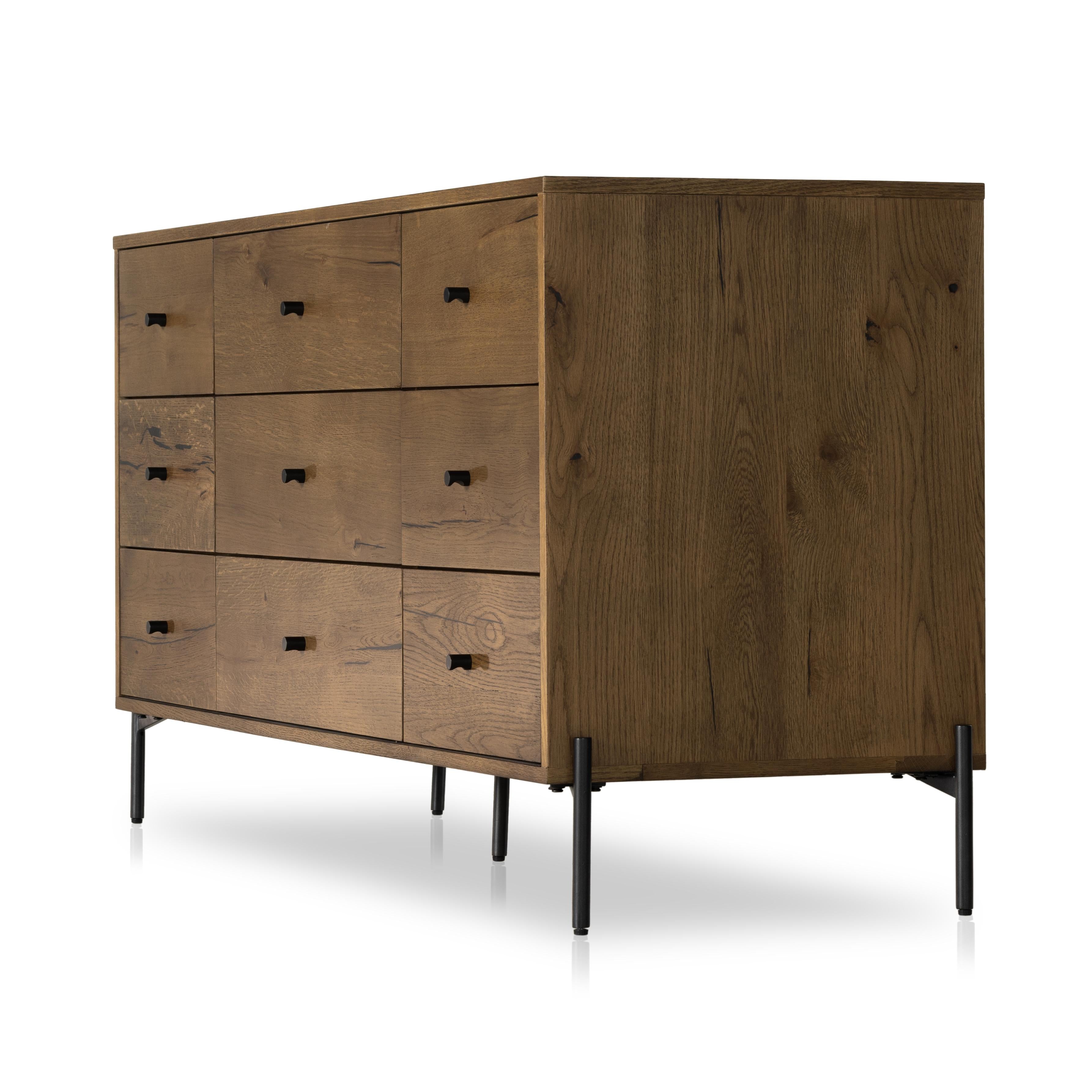 Liam 9 Drawer Dresser in amber oak side view angled