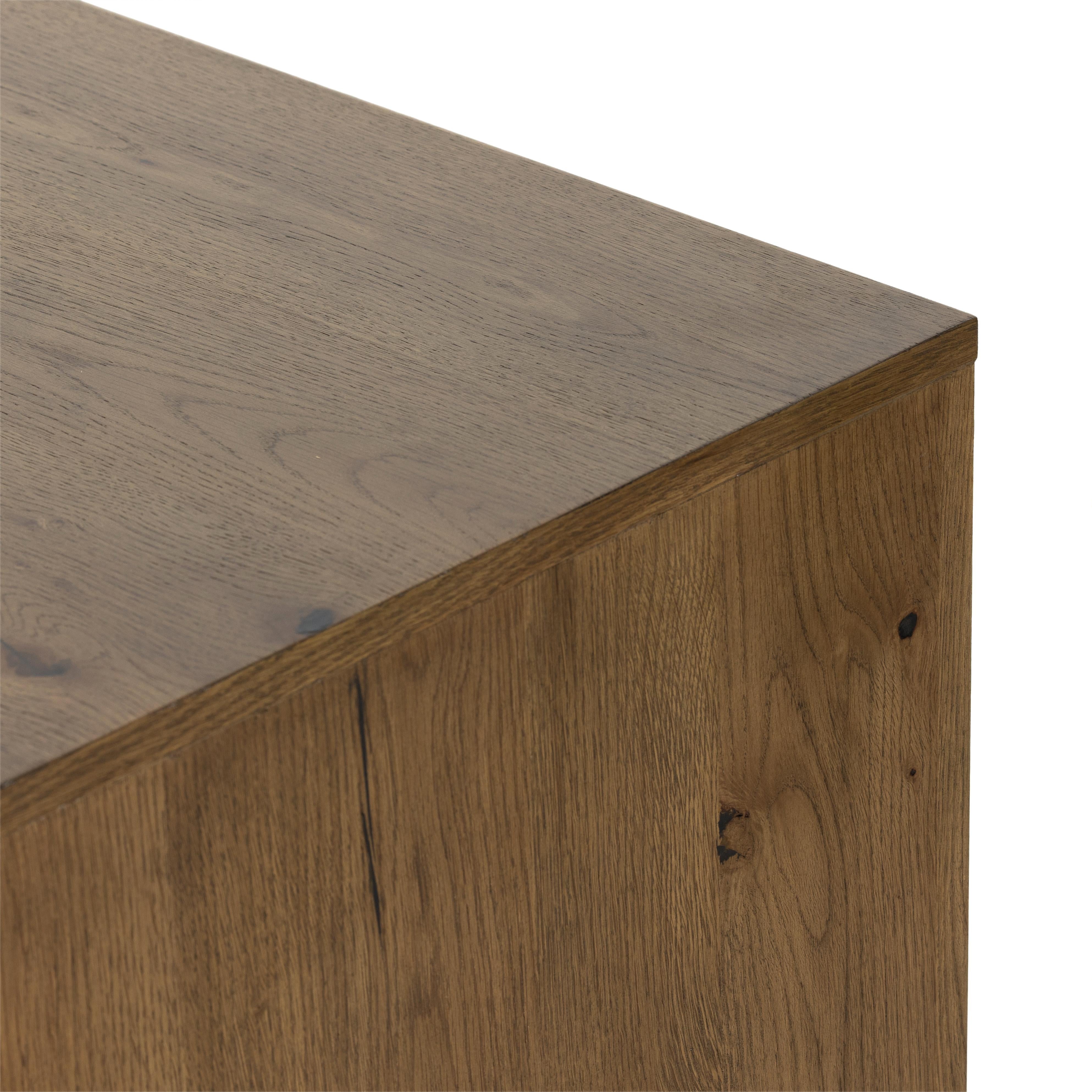 Liam 9 Drawer Dresser in amber oak close up of top back corner