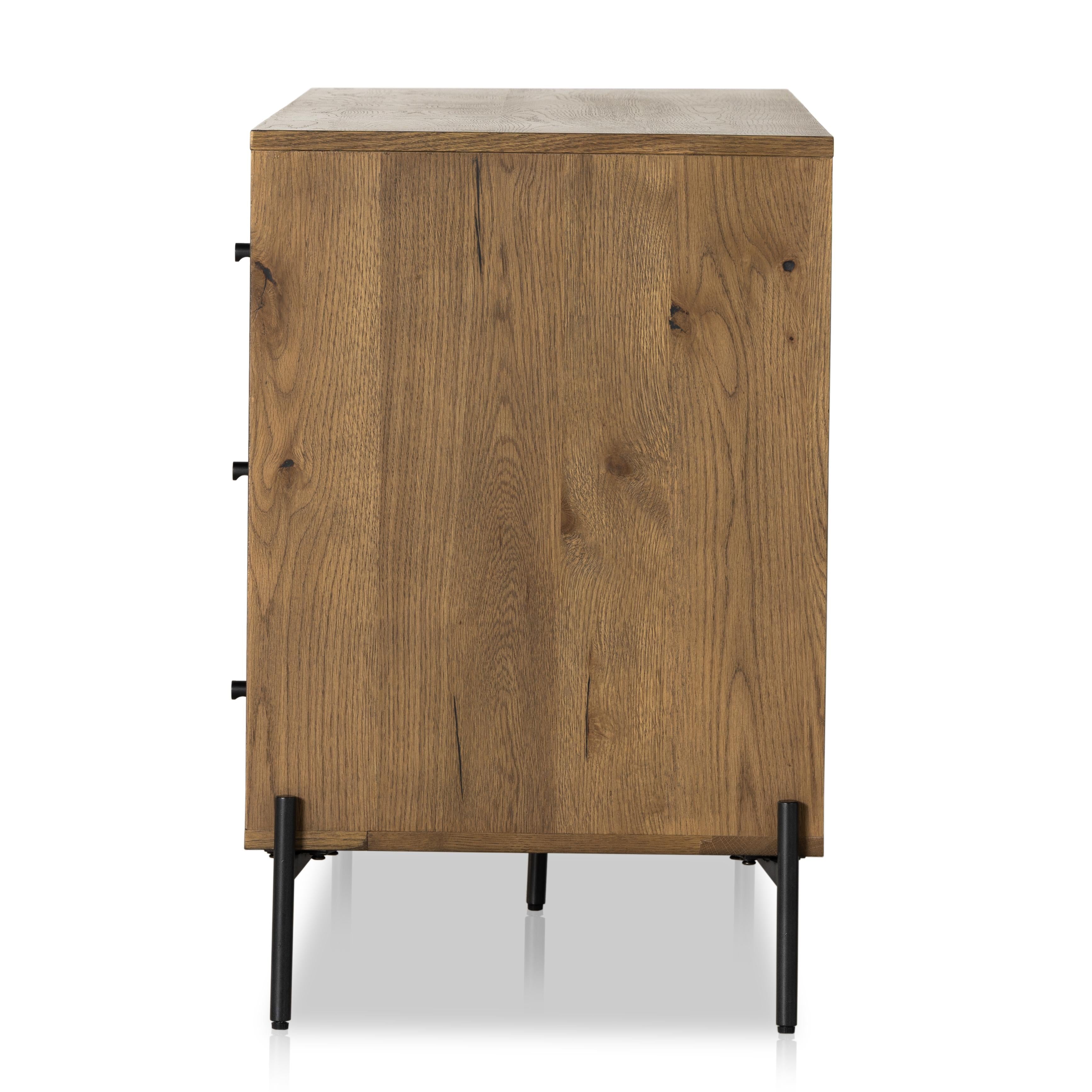 Liam 9 Drawer Dresser in amber oak side view