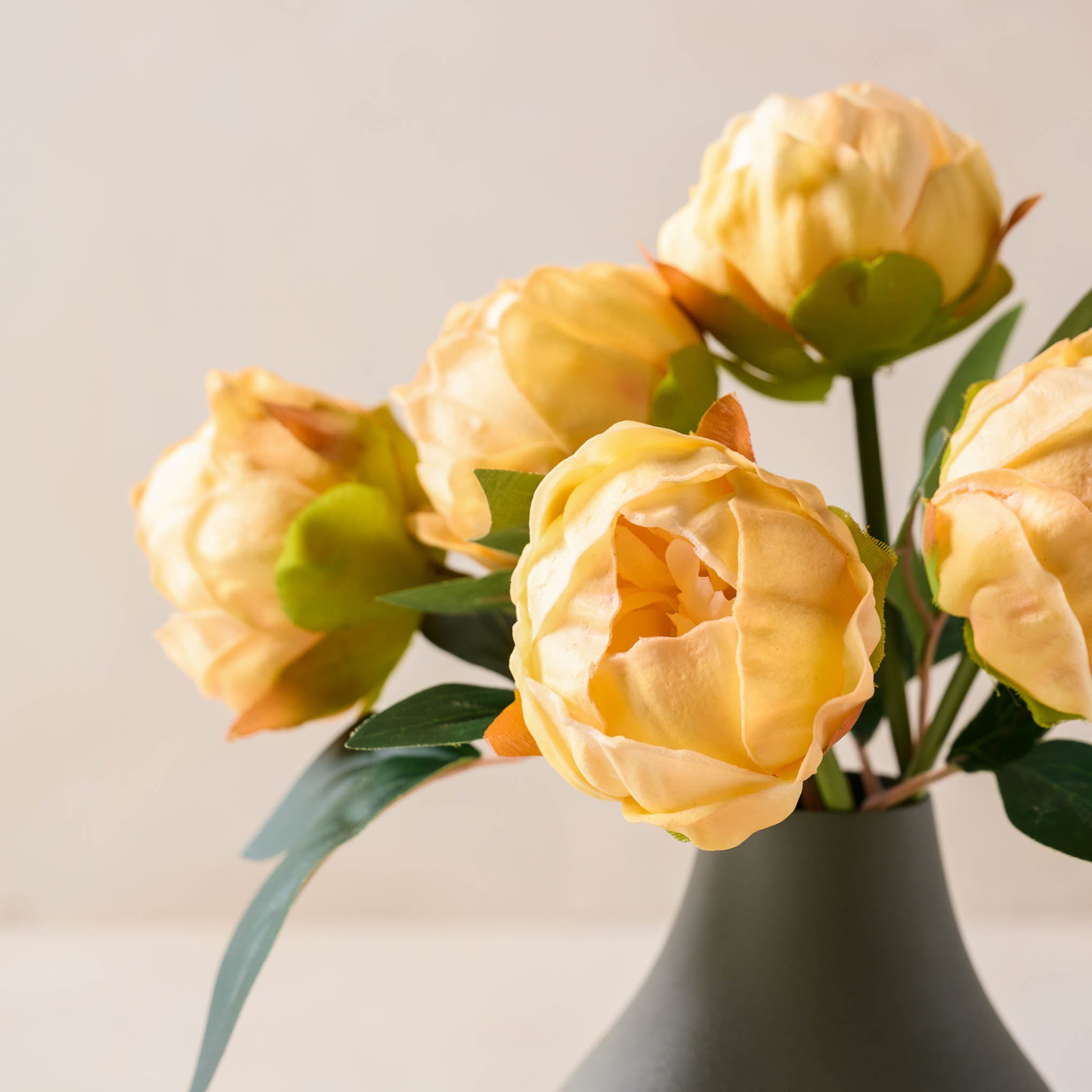 Close up of individual floral on Peony Bundle in peach