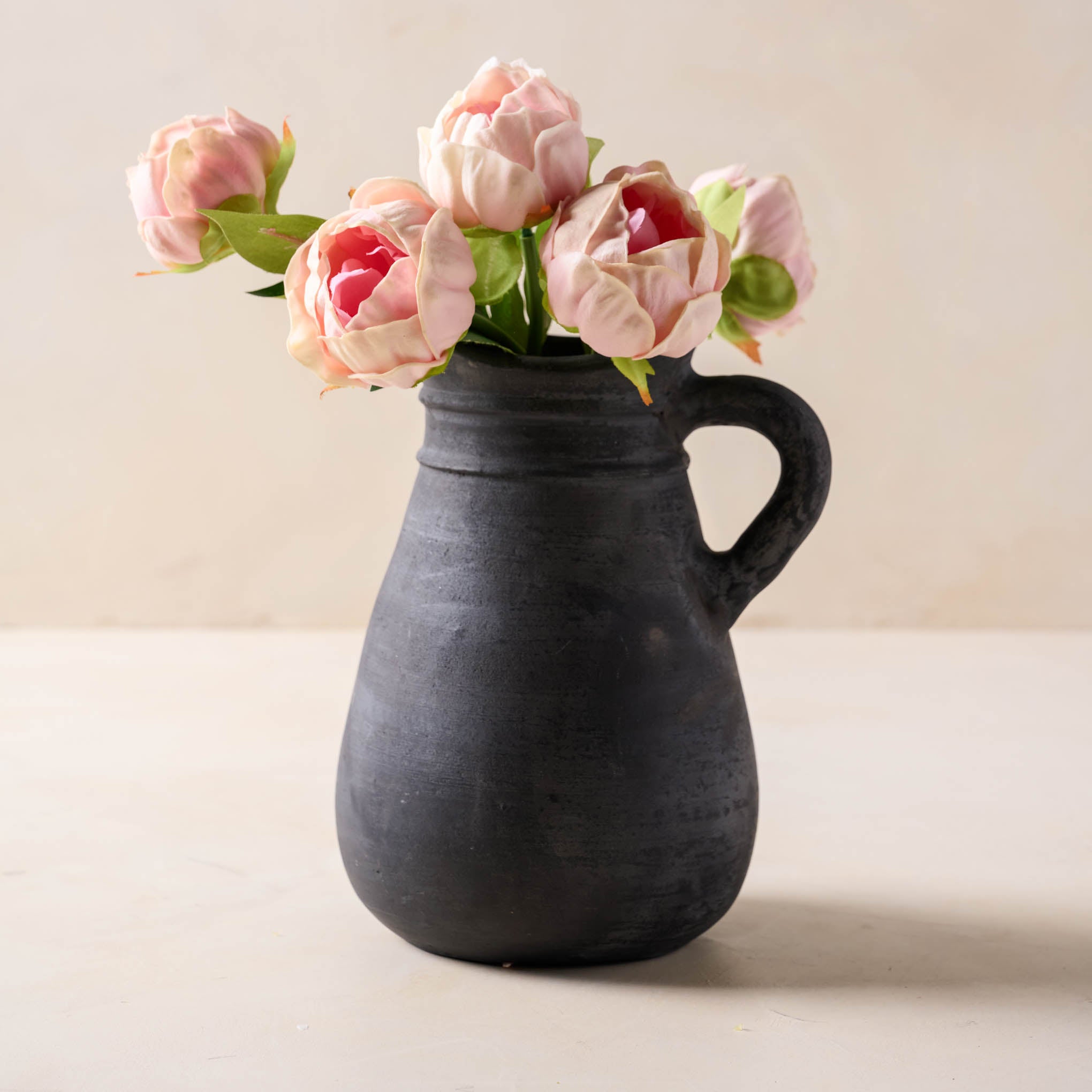 peony bundle in pink in jug vase