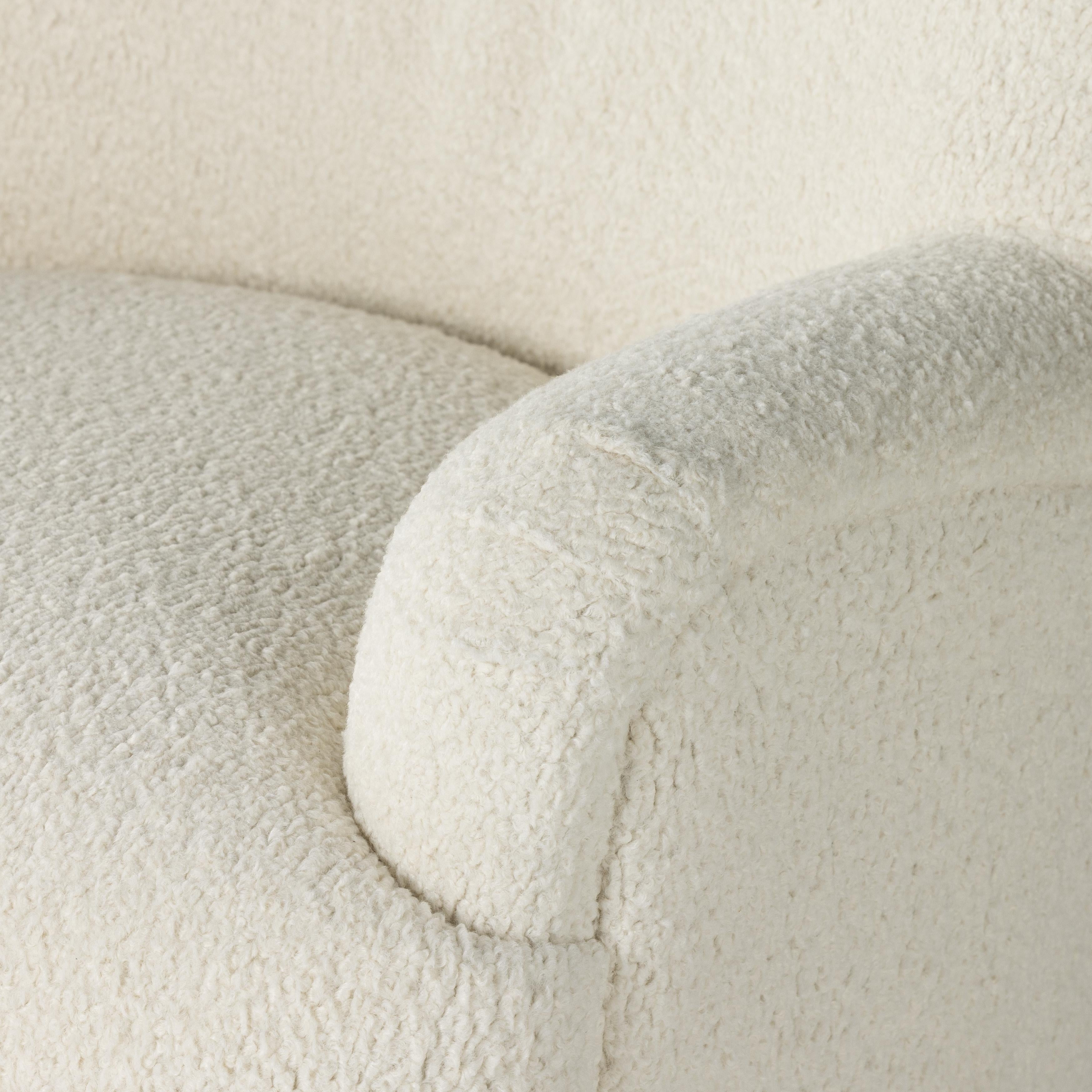 Ruby Swivel Chair in Almond close up of armrest