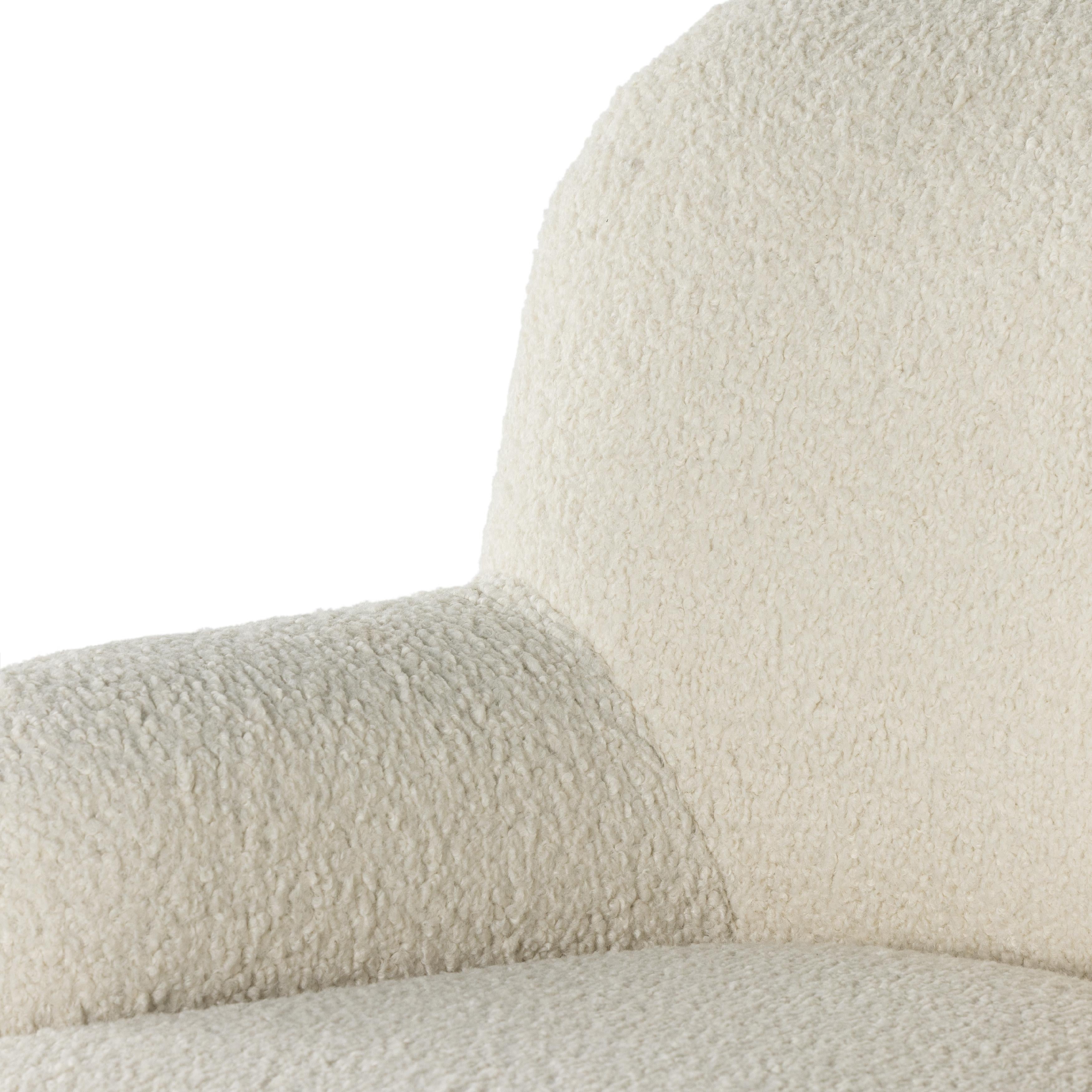 Ruby Swivel Chair in Almond close up of seat, armrest and back rest