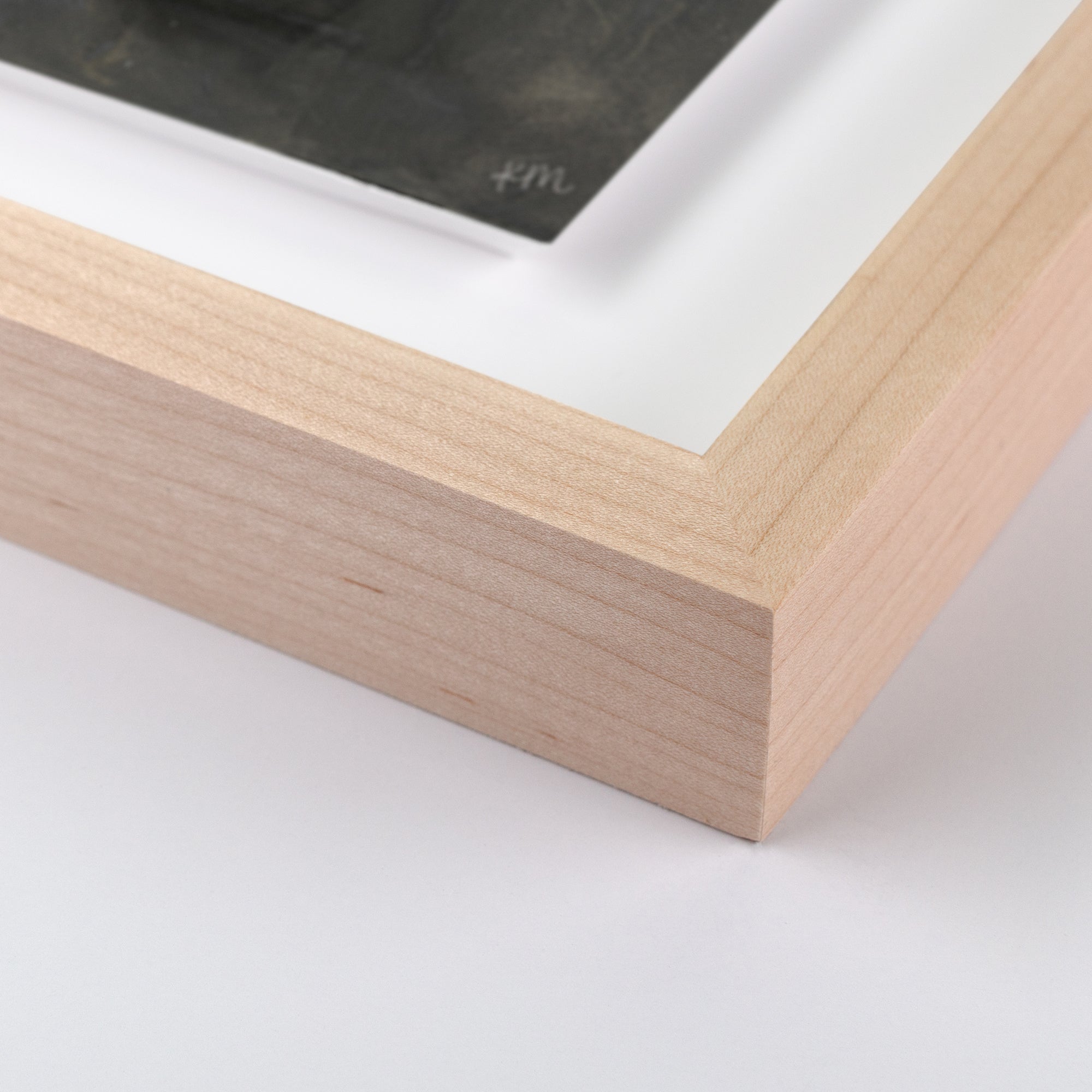 corner edge view of wood frame surrounding Night Divine by Katie Mulder
