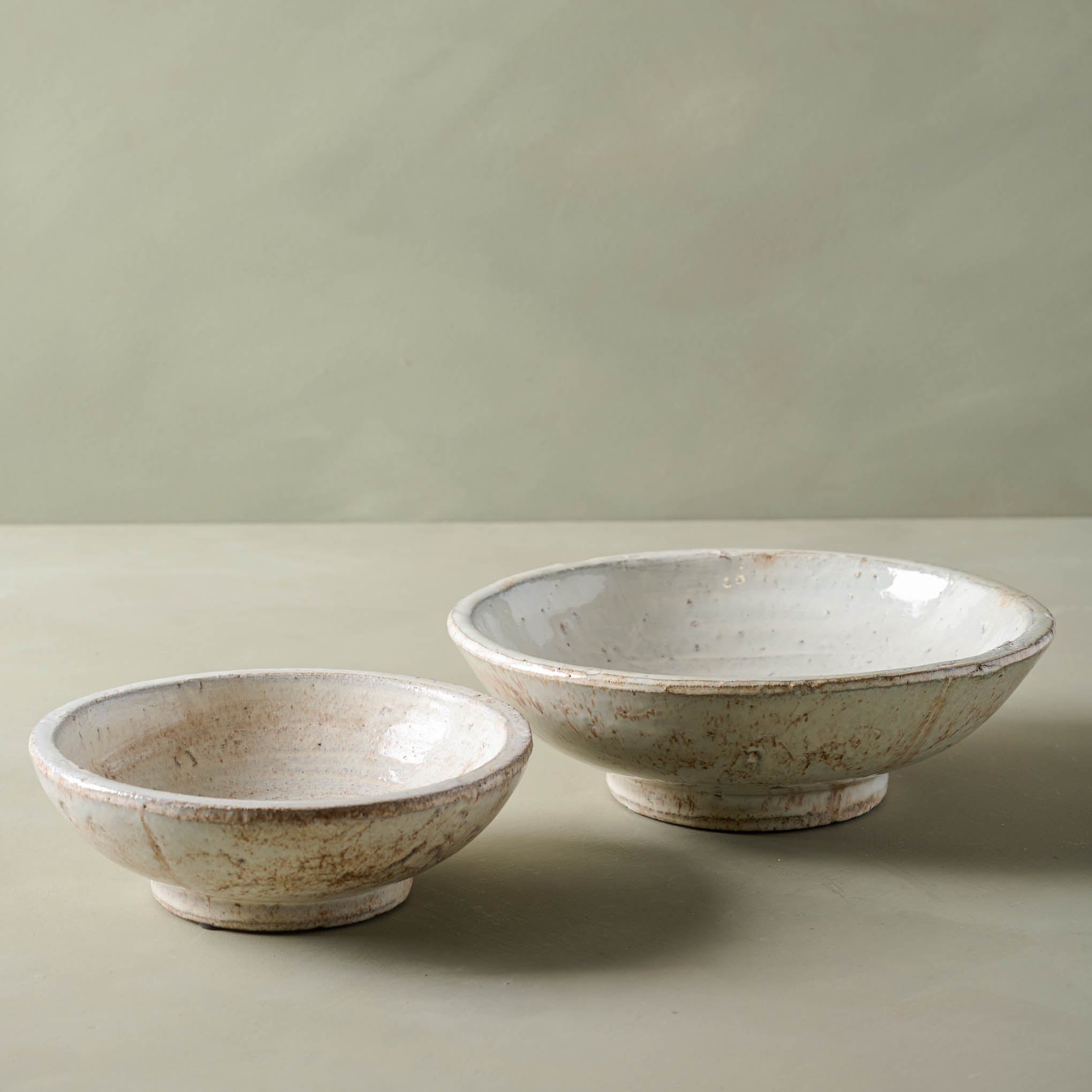 Large and small sizes of rustic cream accent bowl