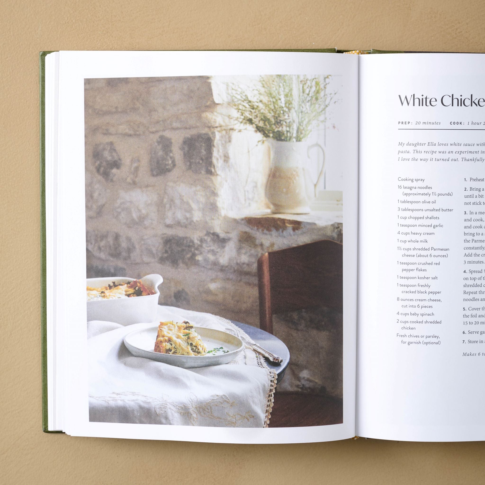 Joanna Gaines Magnoliass Table Cookbook Volume 3 open to a page with a photo of quiche