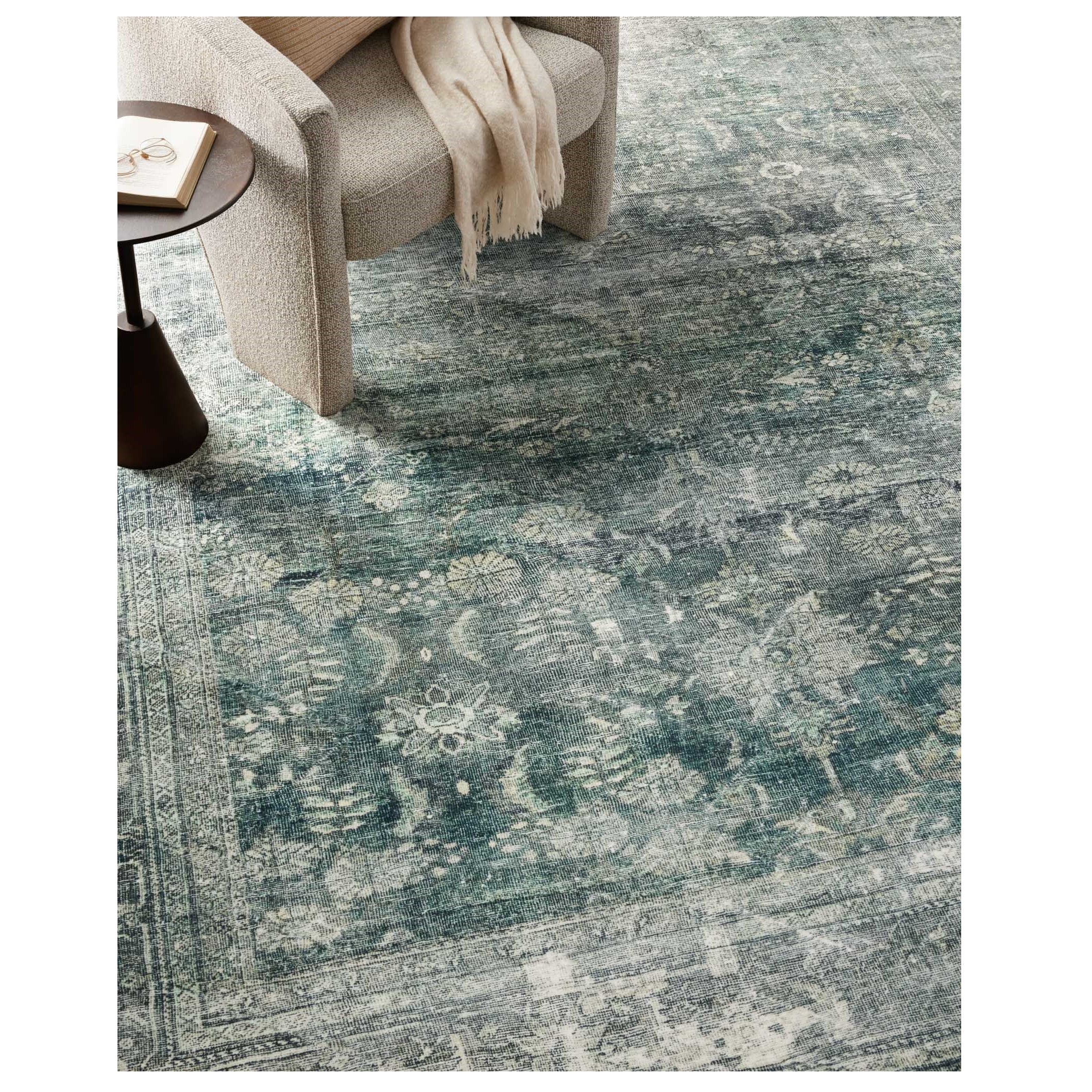 Banks Blue Lagoon Rug under a chair
