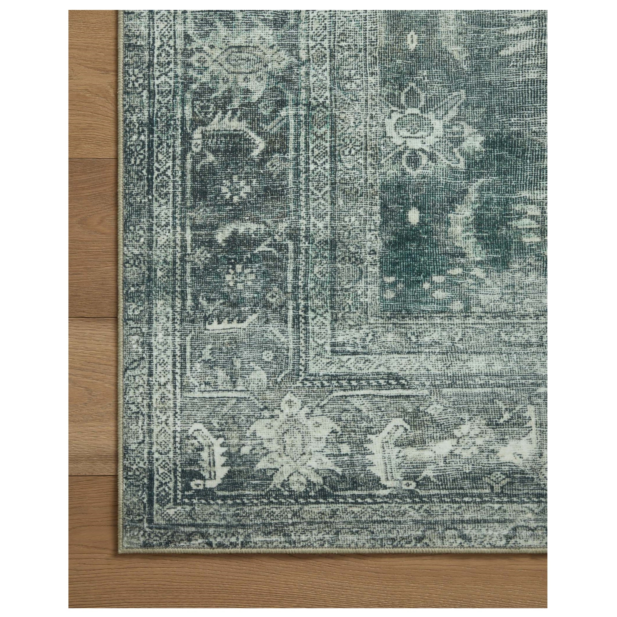 Banks Blue Lagoon Rug corner on wood floor