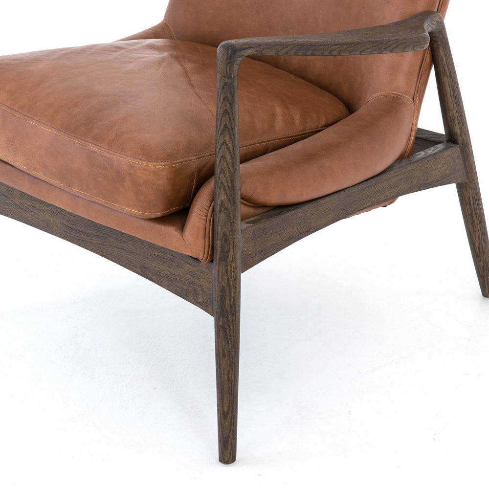 distressed brown leather mid century modern arm chair with wooden arms and legs