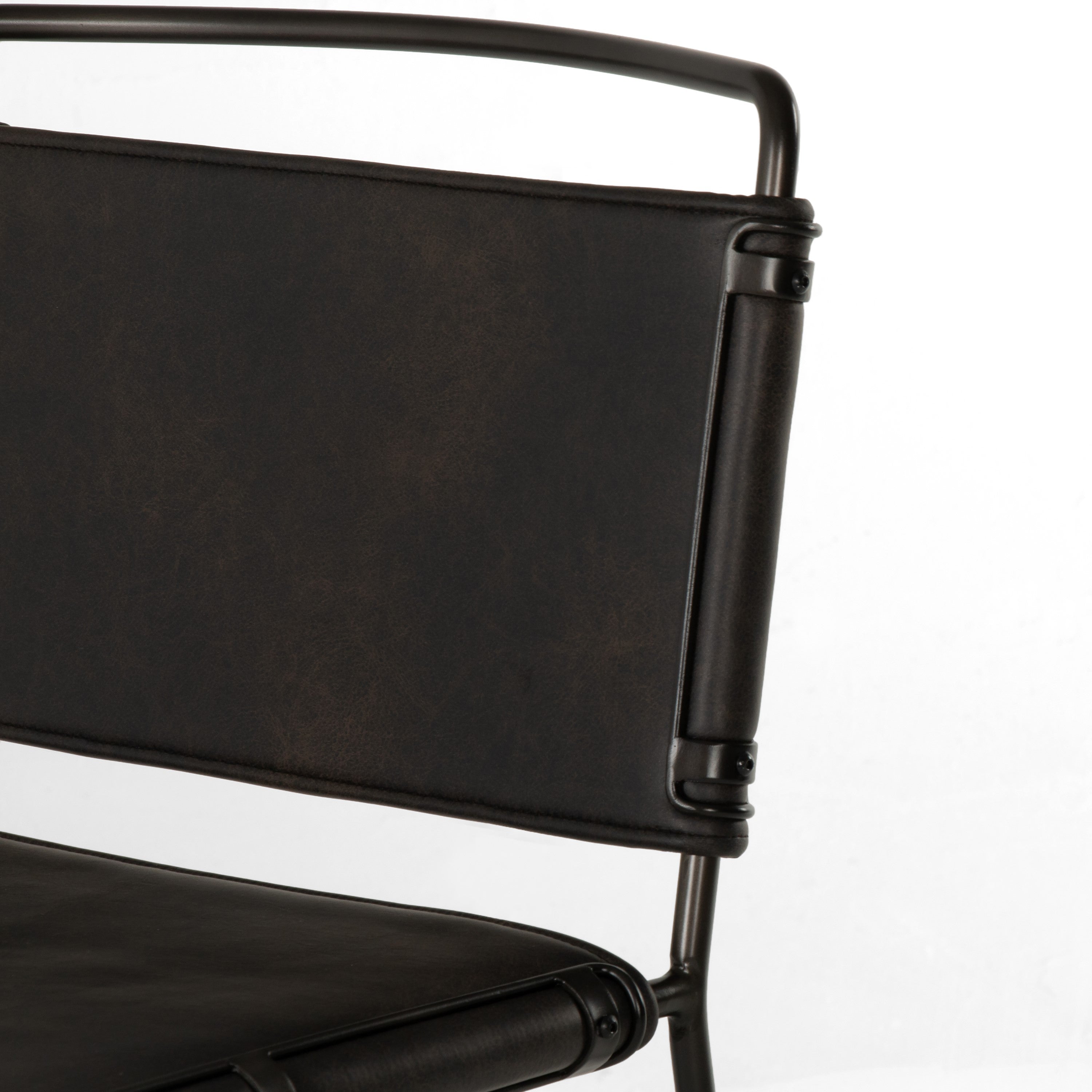 black metal bar stool with black leather seat and back