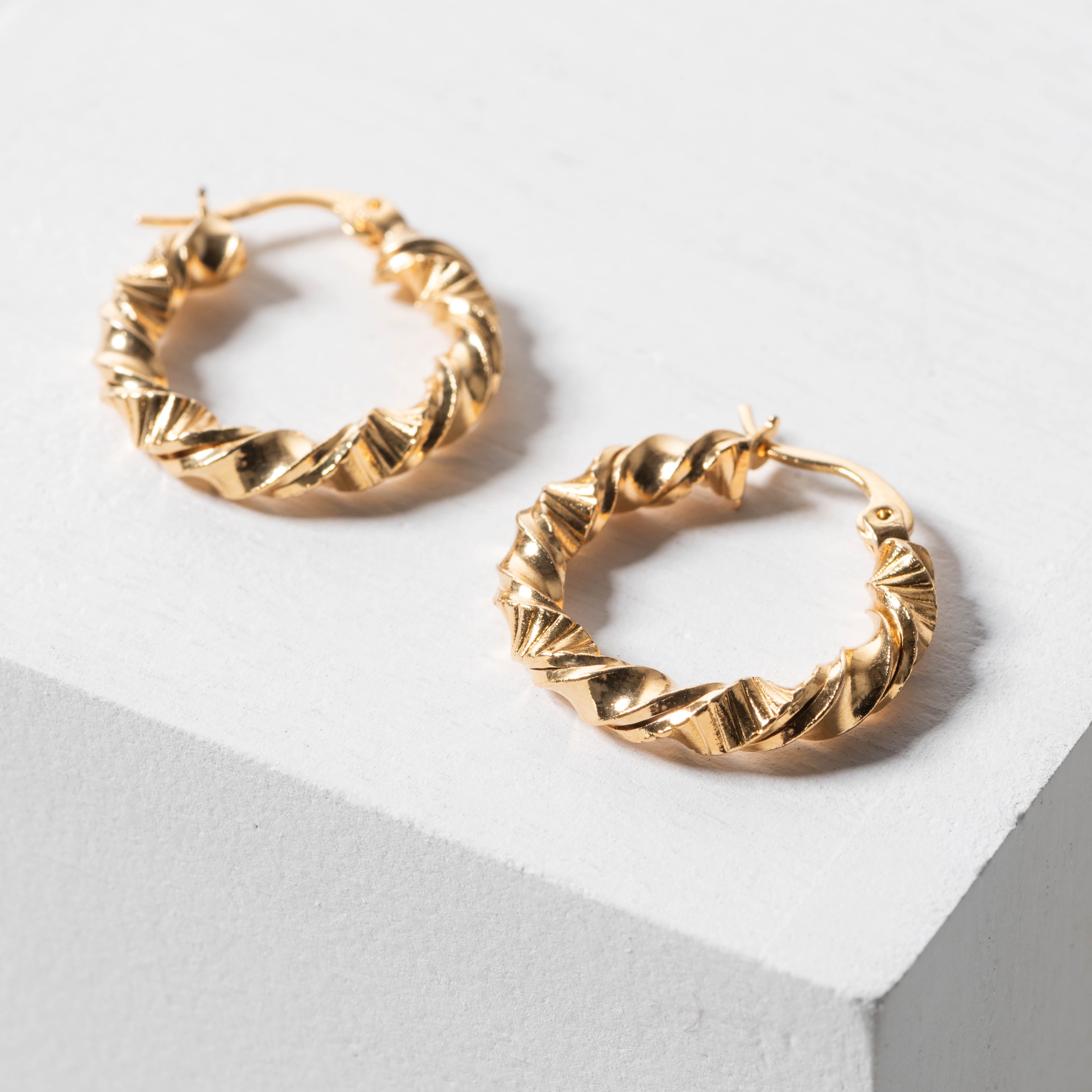 Magnoliass twisted gold hoop earrings
