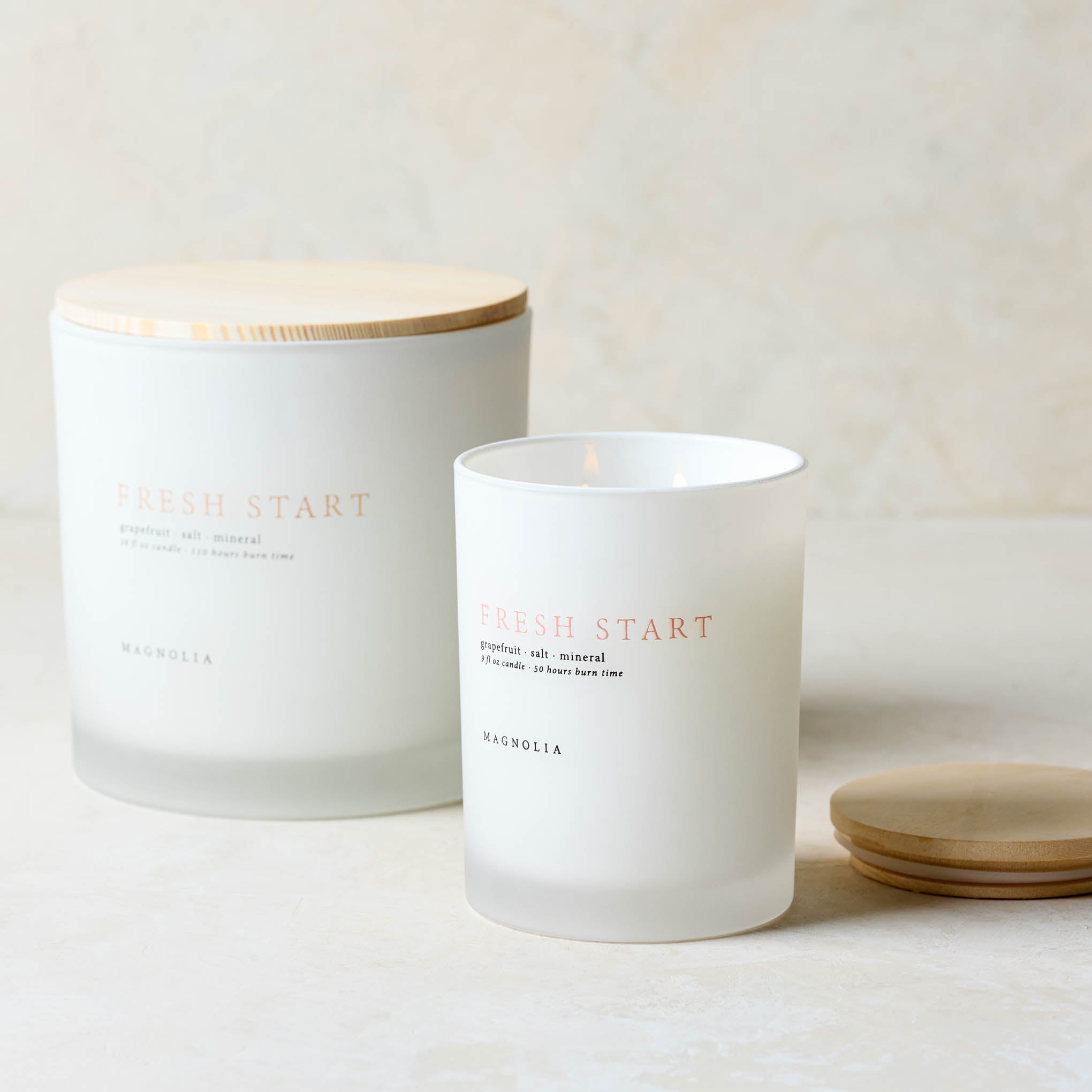 Magnoliass fresh start candle with wood lid notes scents of grapefruit salt and mineral