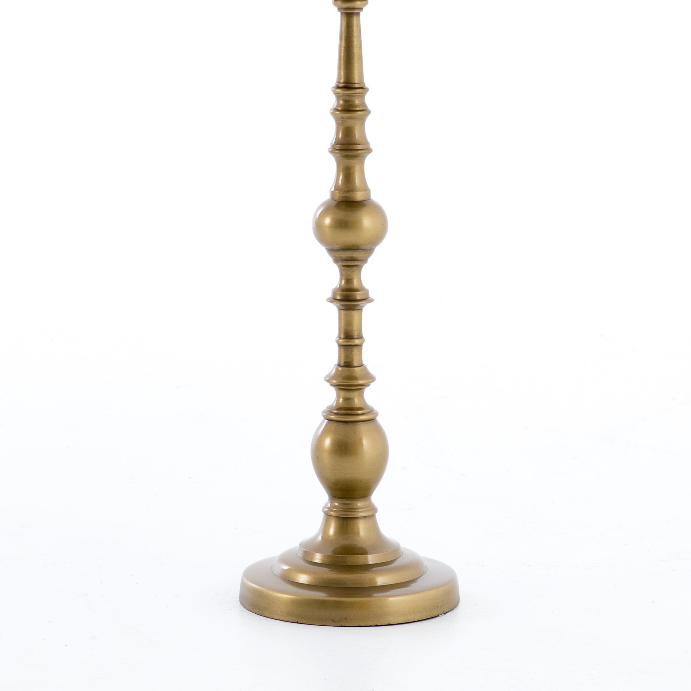 brass pedestal accent table
