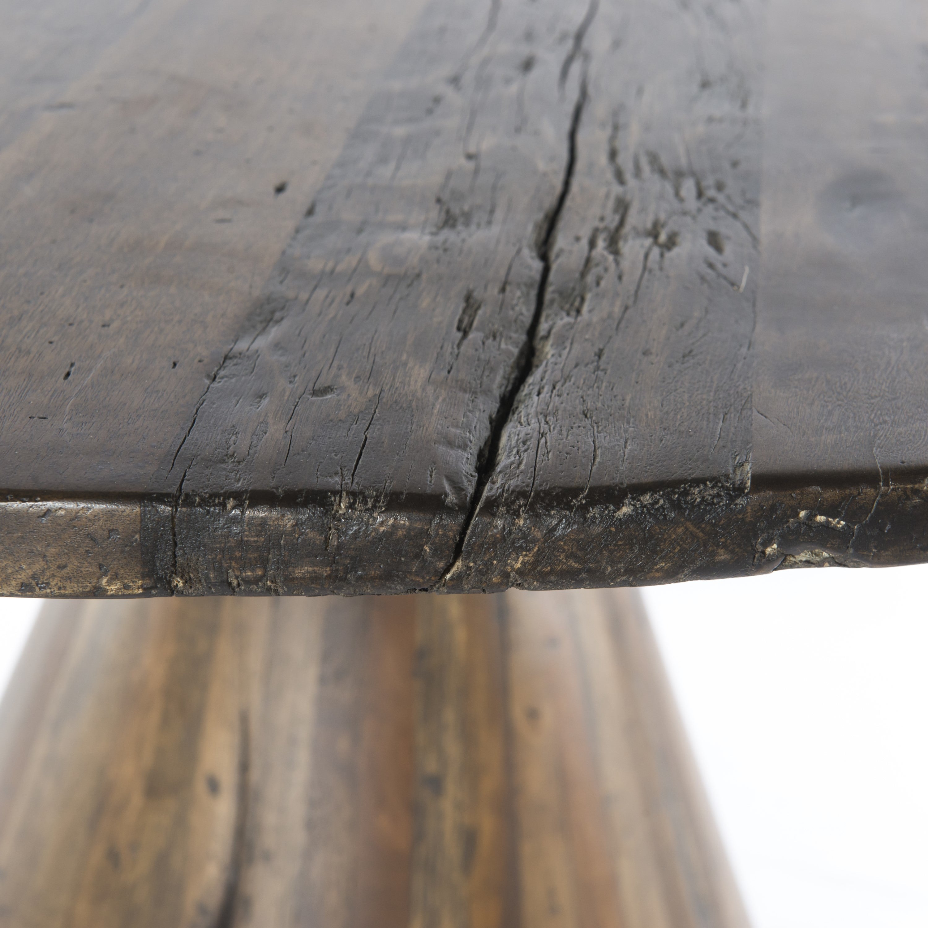 modern reclaimed wood dining table with conical pedestal base