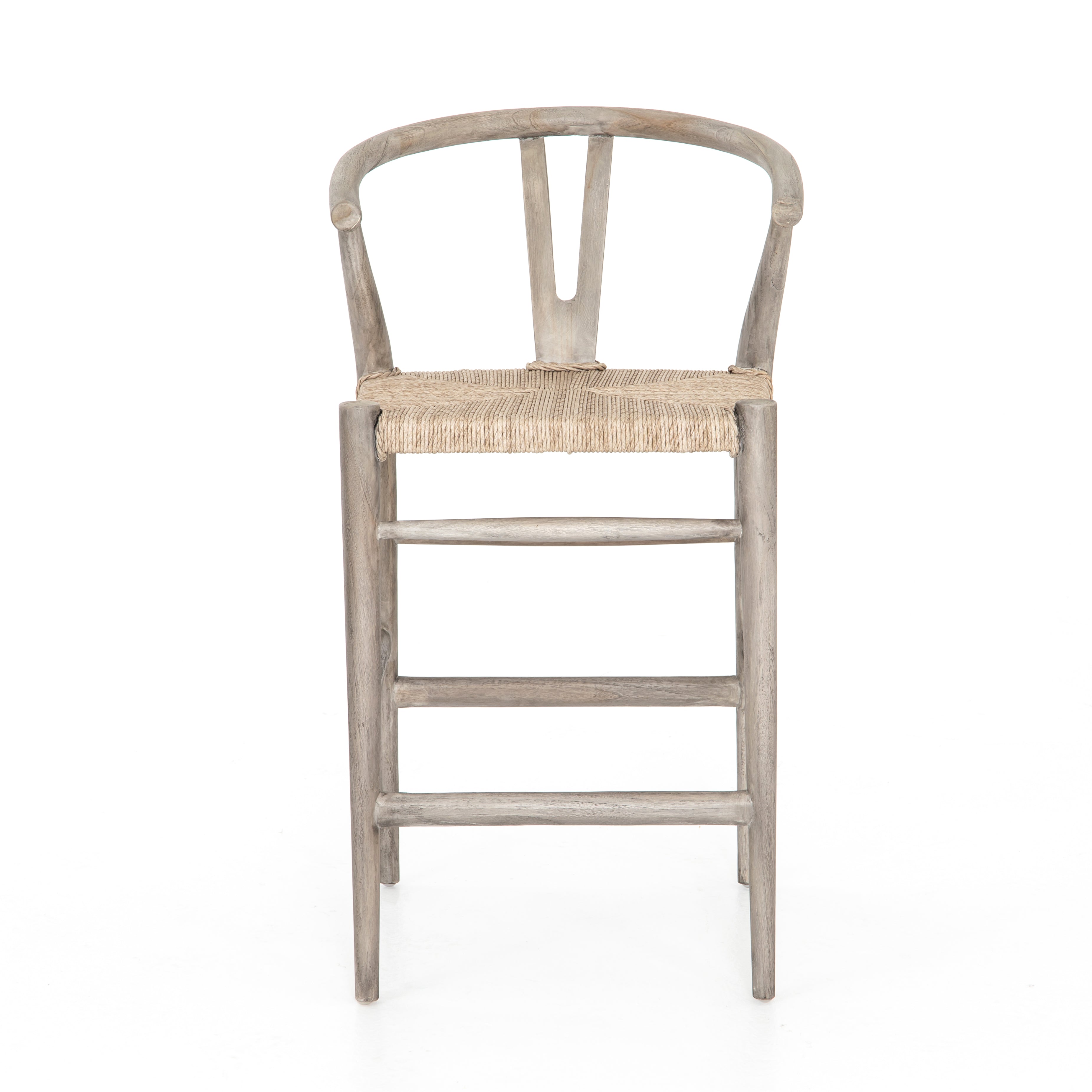 weathered grey wooden counter stool with curved back and woven seagrass seat