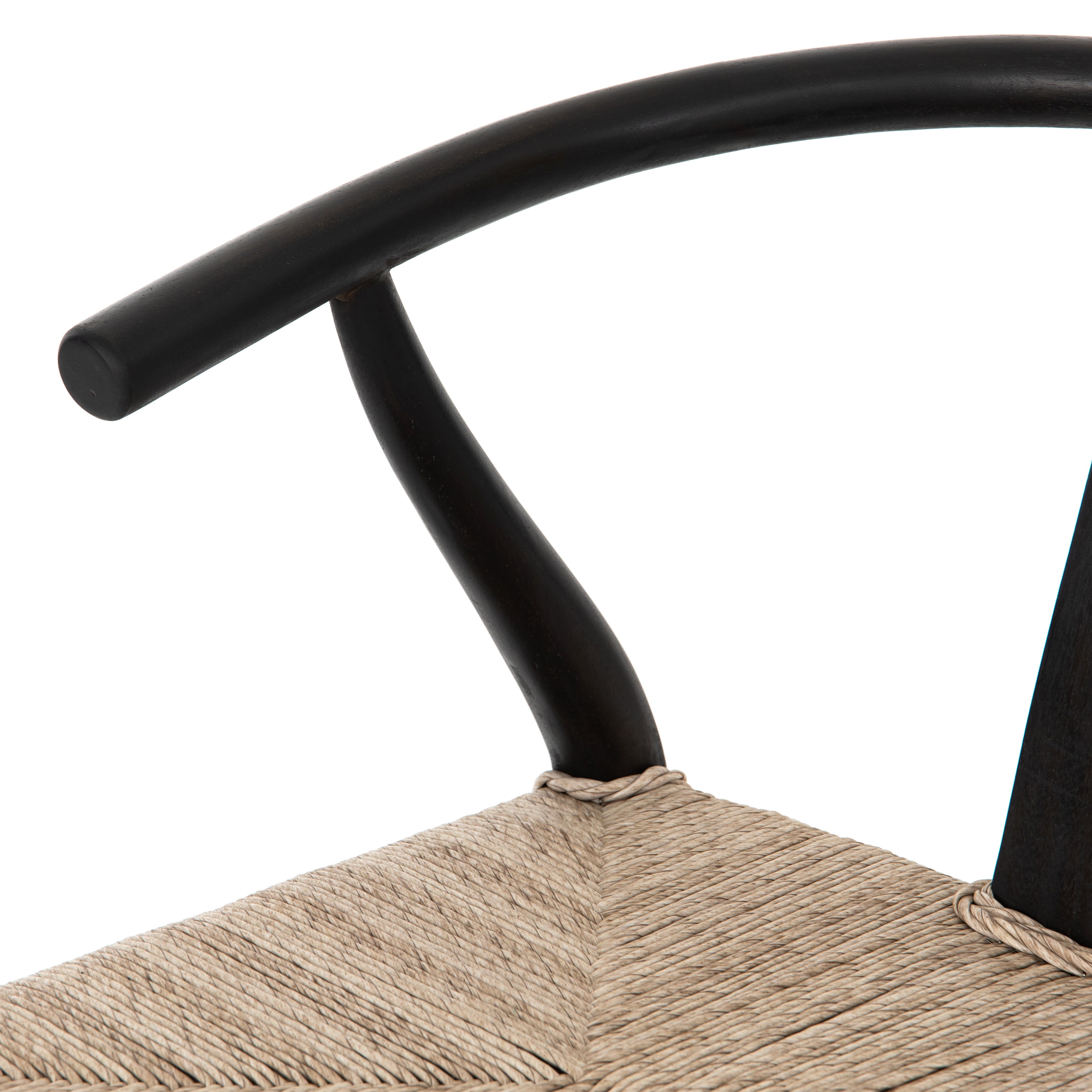 black wooden counter stool with curved back and woven seagrass seat