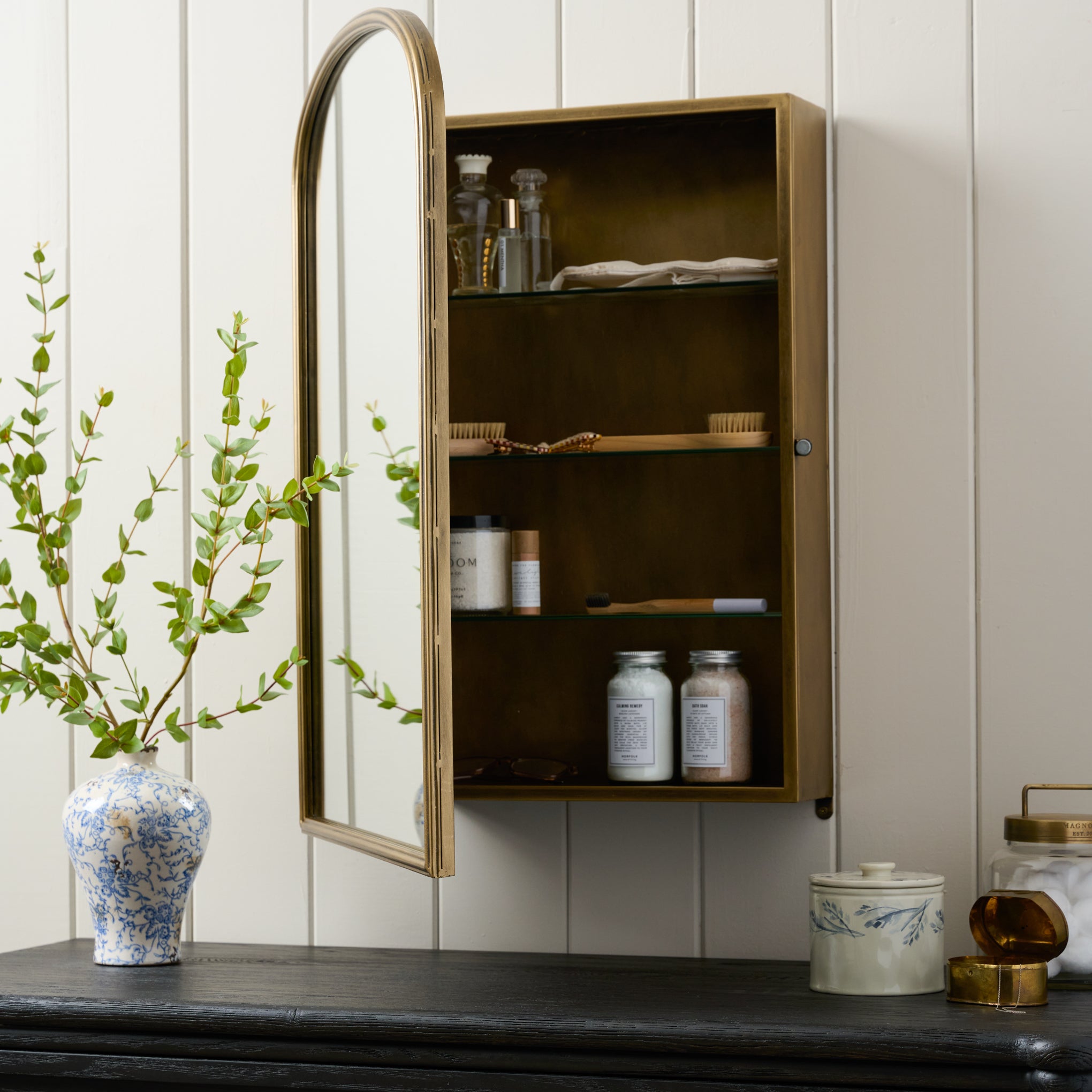 Archer Medicine Cabinet open showing products on shelves inside