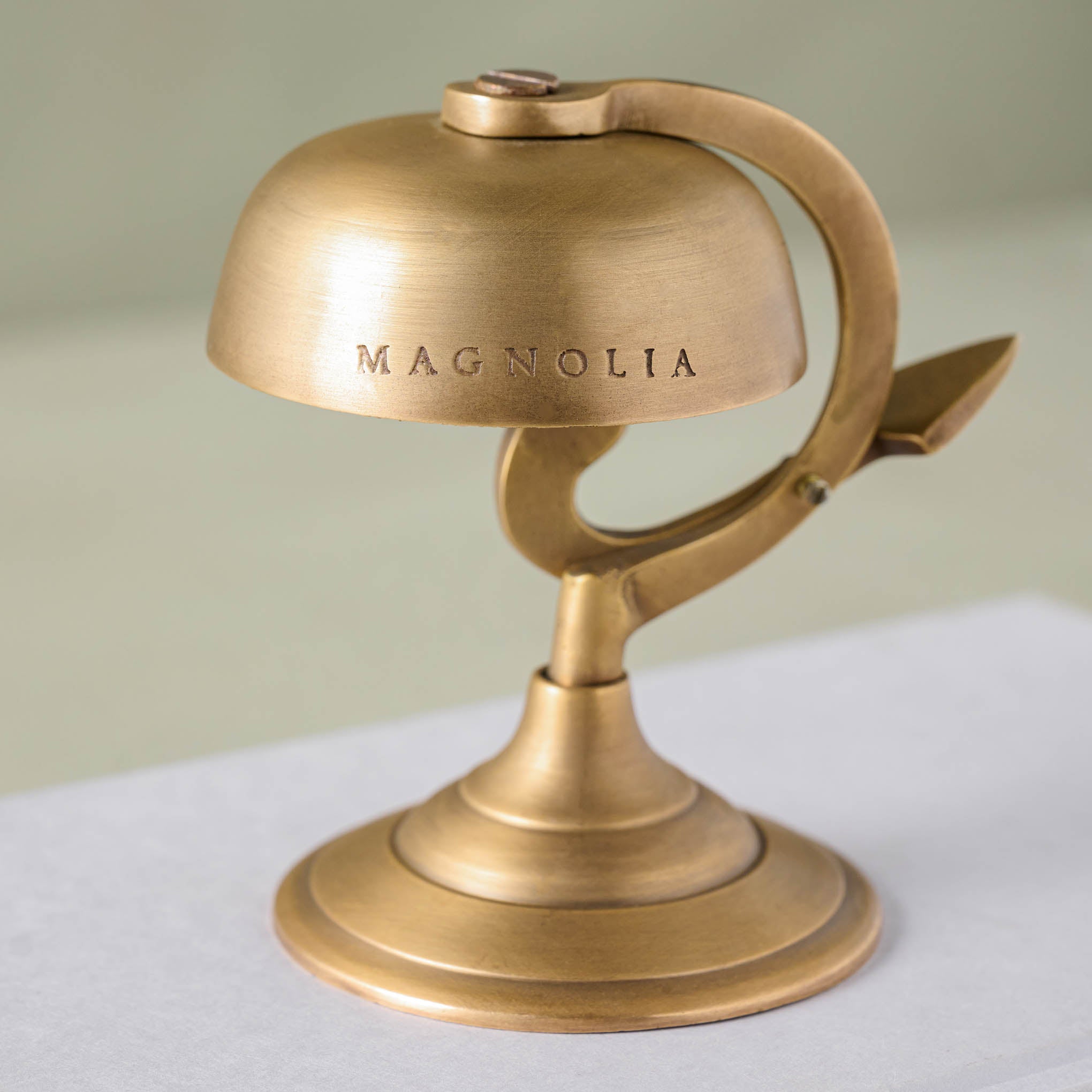 Antique Brass Bell engraved with Magnoliass logo
