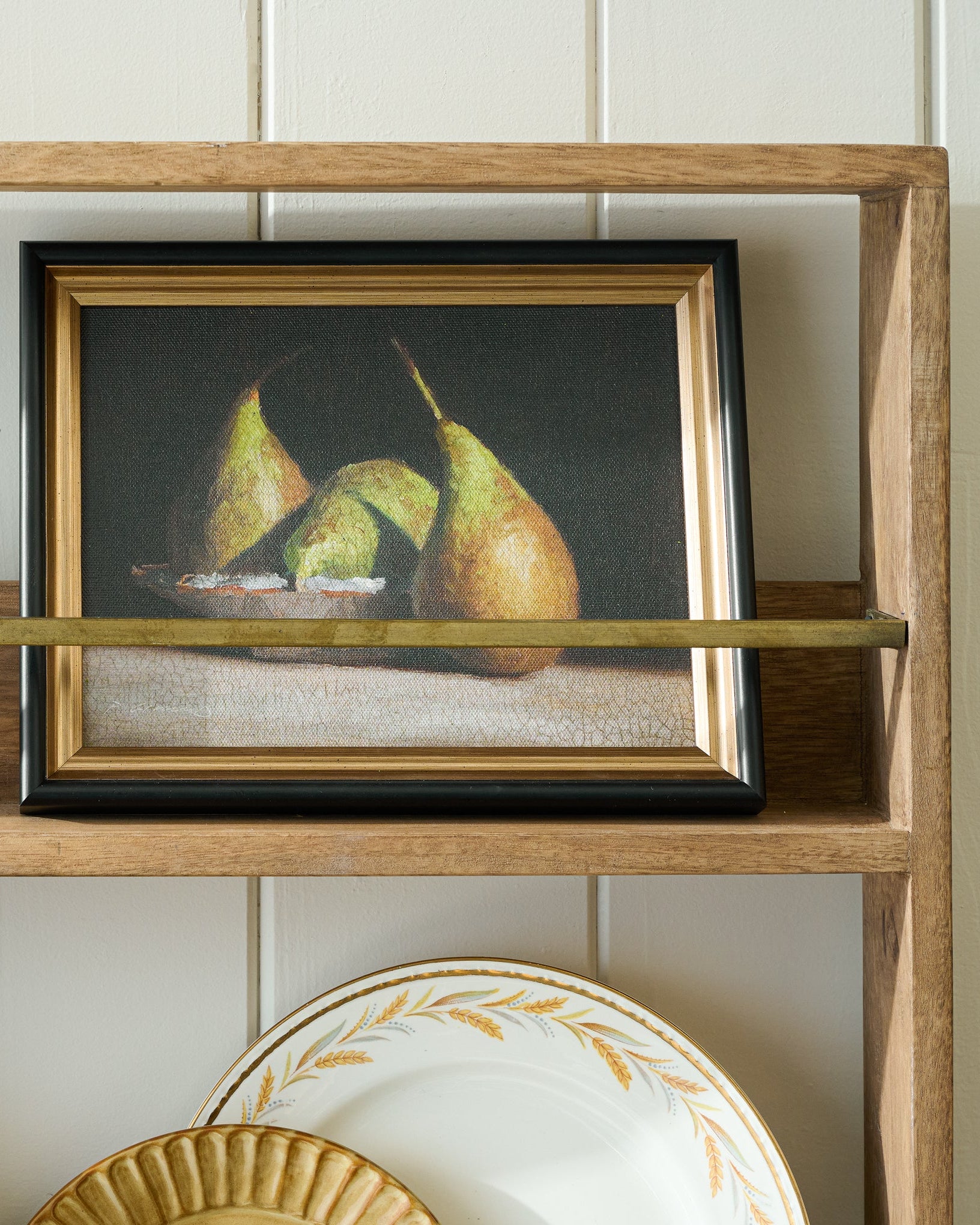 Hannon Wood and Brass Display Shelf with art on shelf