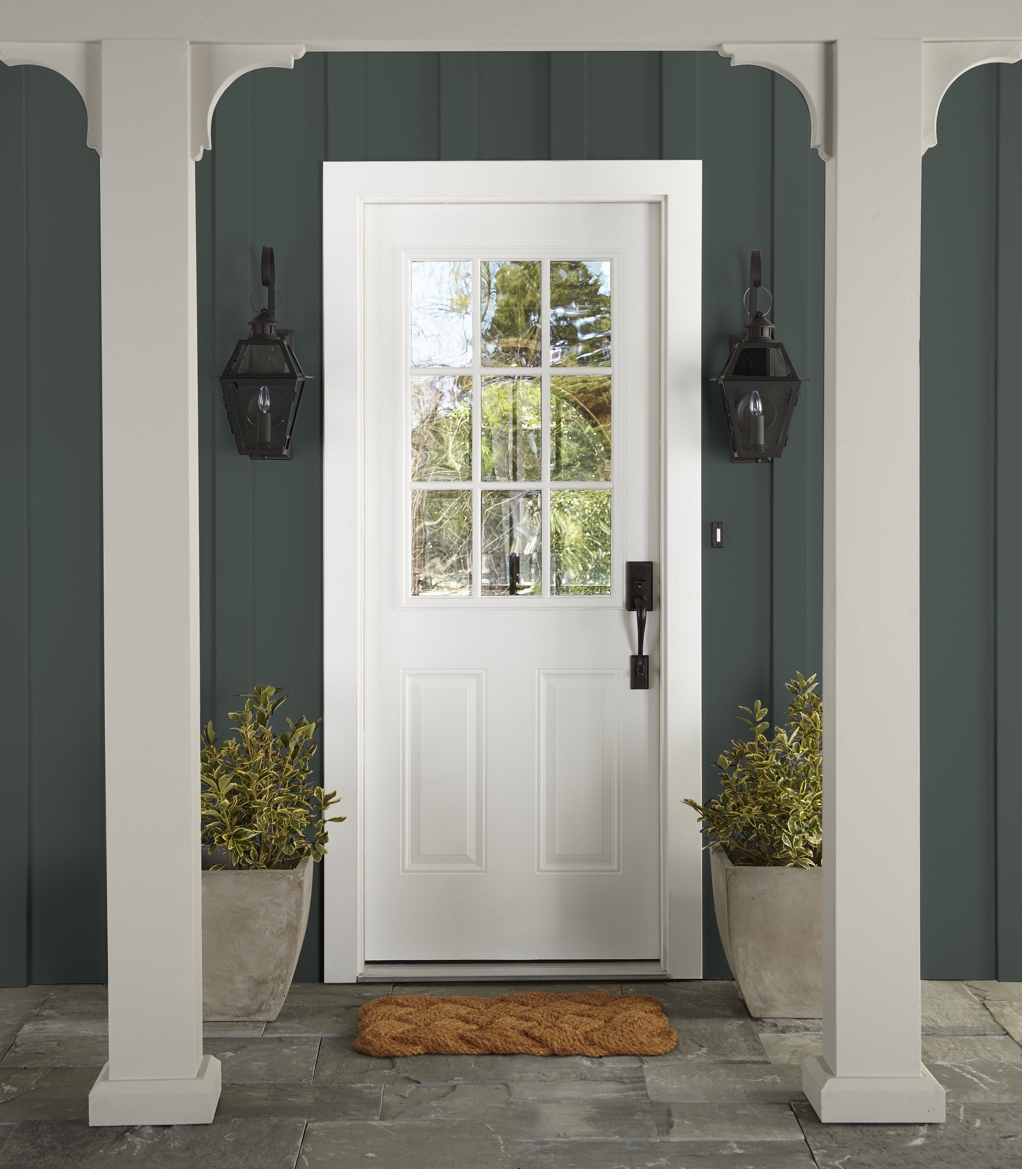 A slightly jeweled forest green hue exterior paint