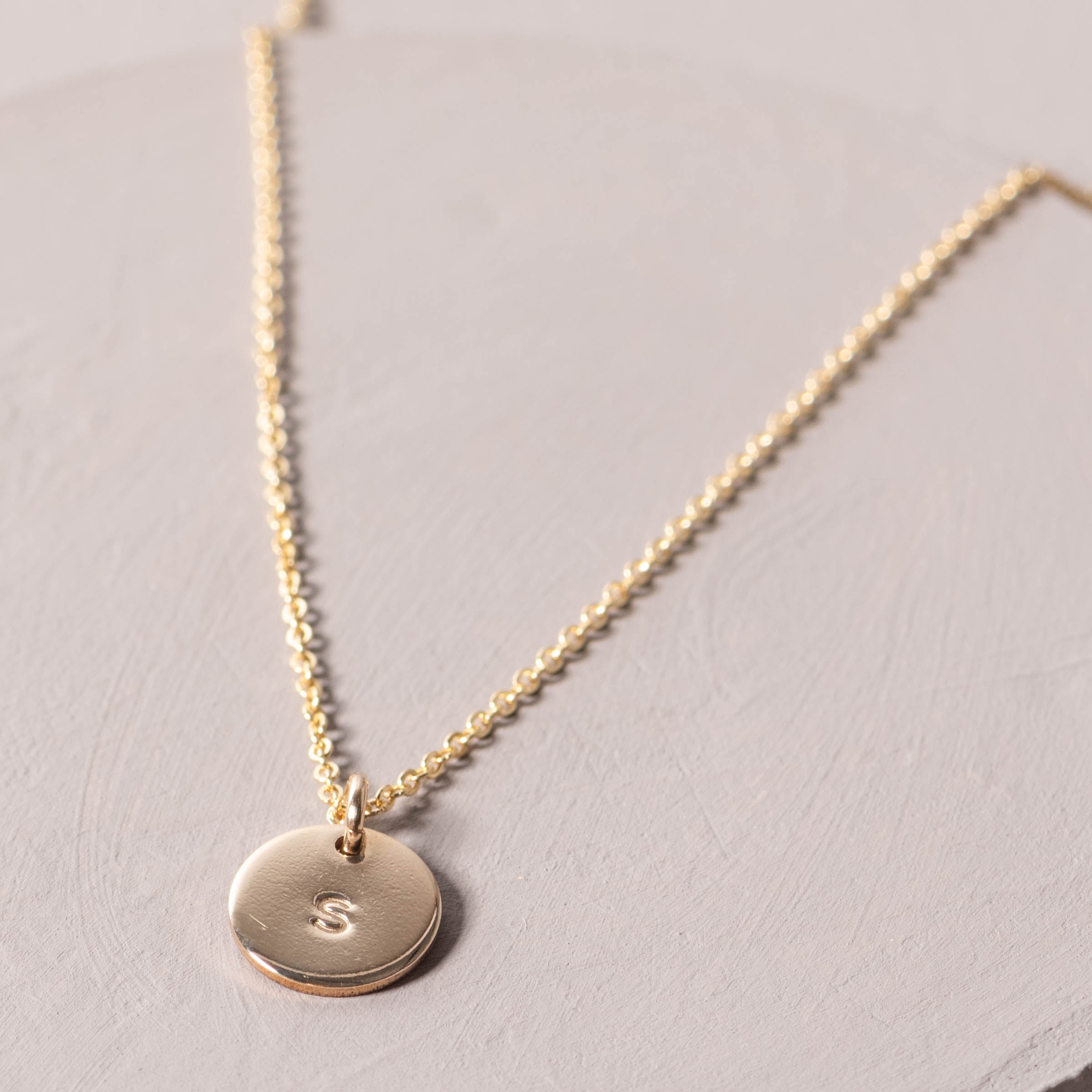Magnoliass gold initial disc necklace