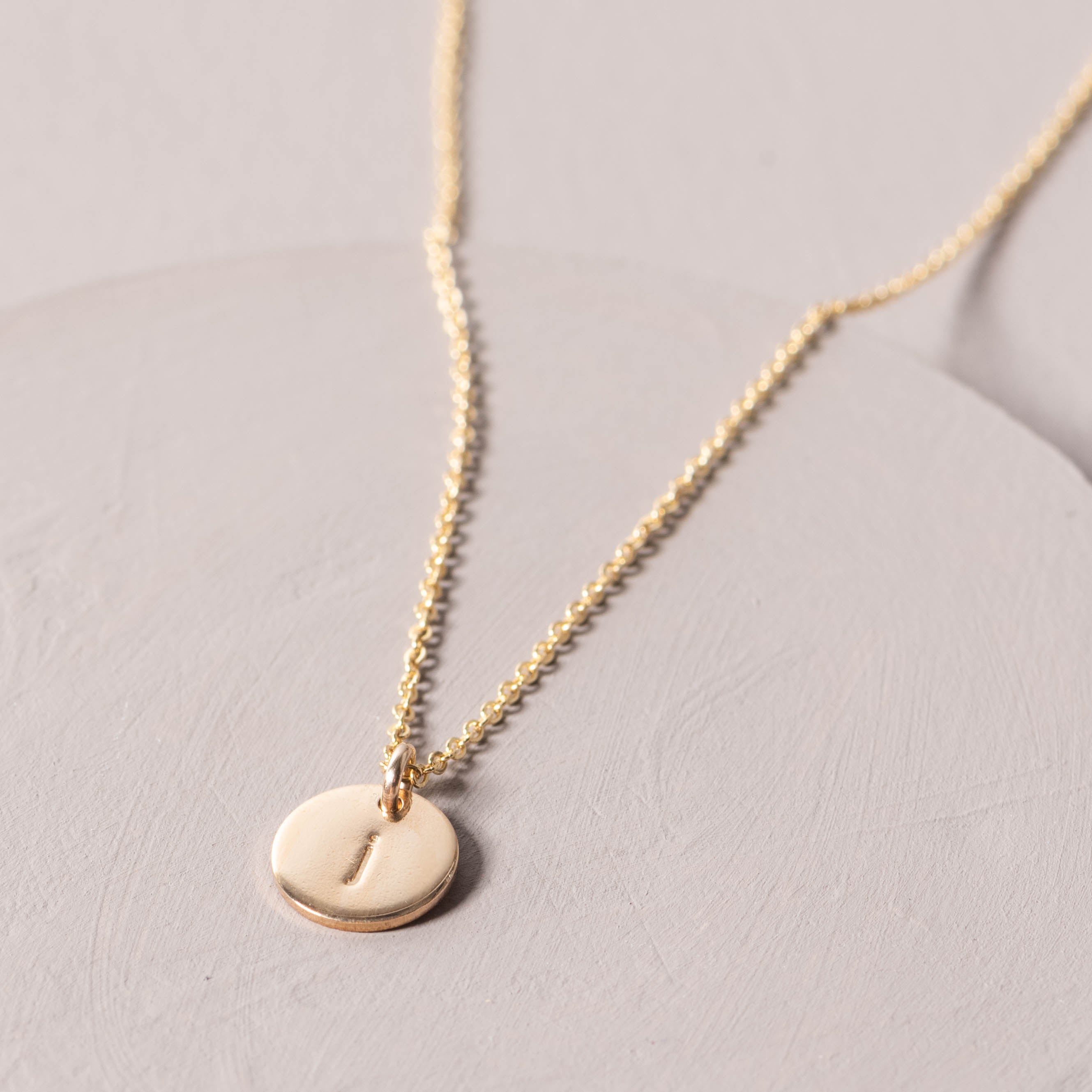 Magnoliass gold initial disc necklace
