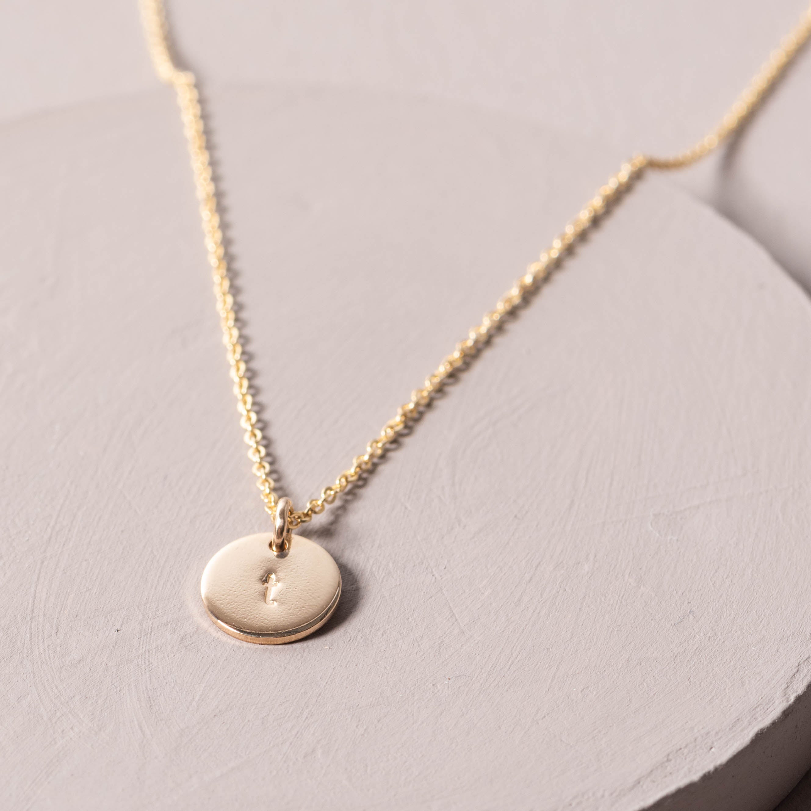Magnoliass gold initial disc necklace