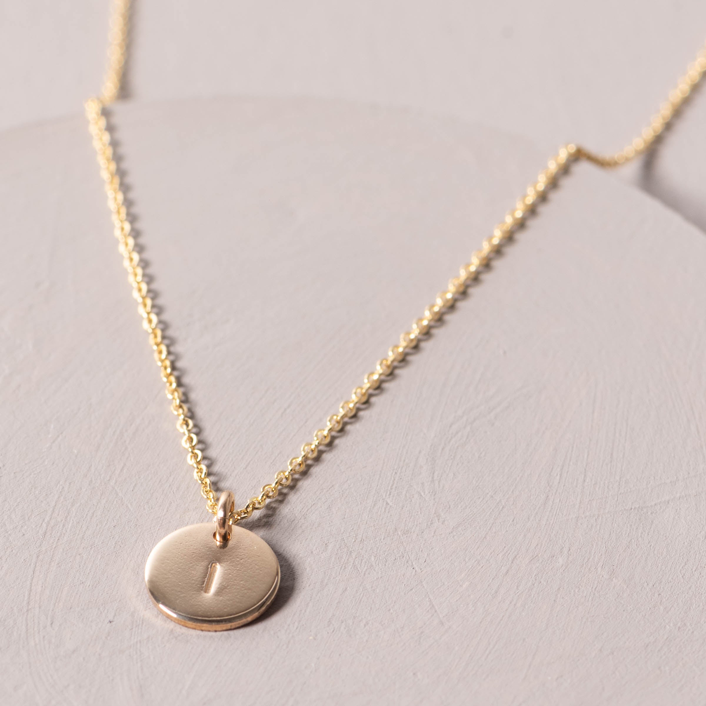 Magnoliass gold initial disc necklace