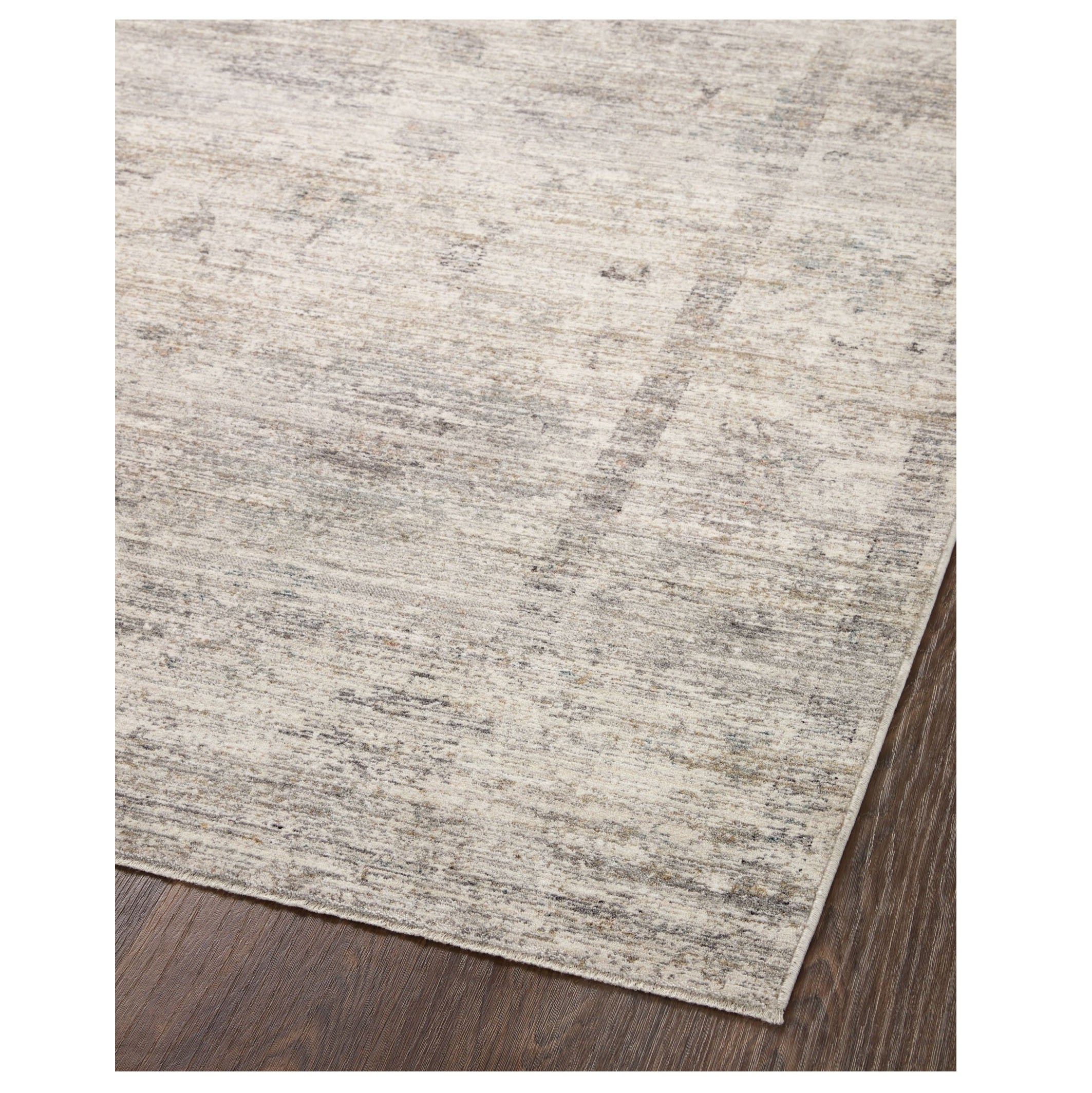 Millie Silver Dove Rug corner on wood floor