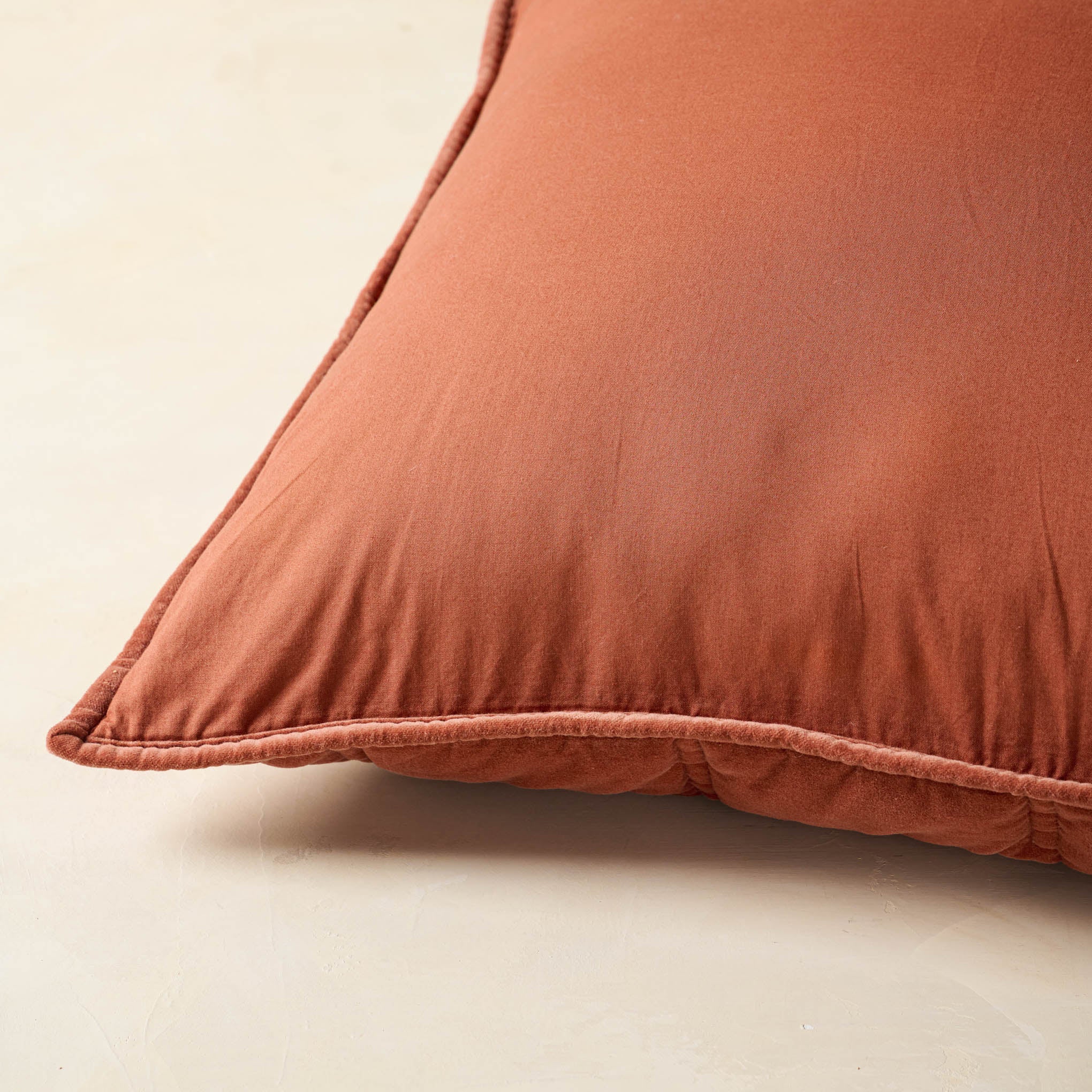 close up of the back of Weekend Velvet Sham - Rustic Clay