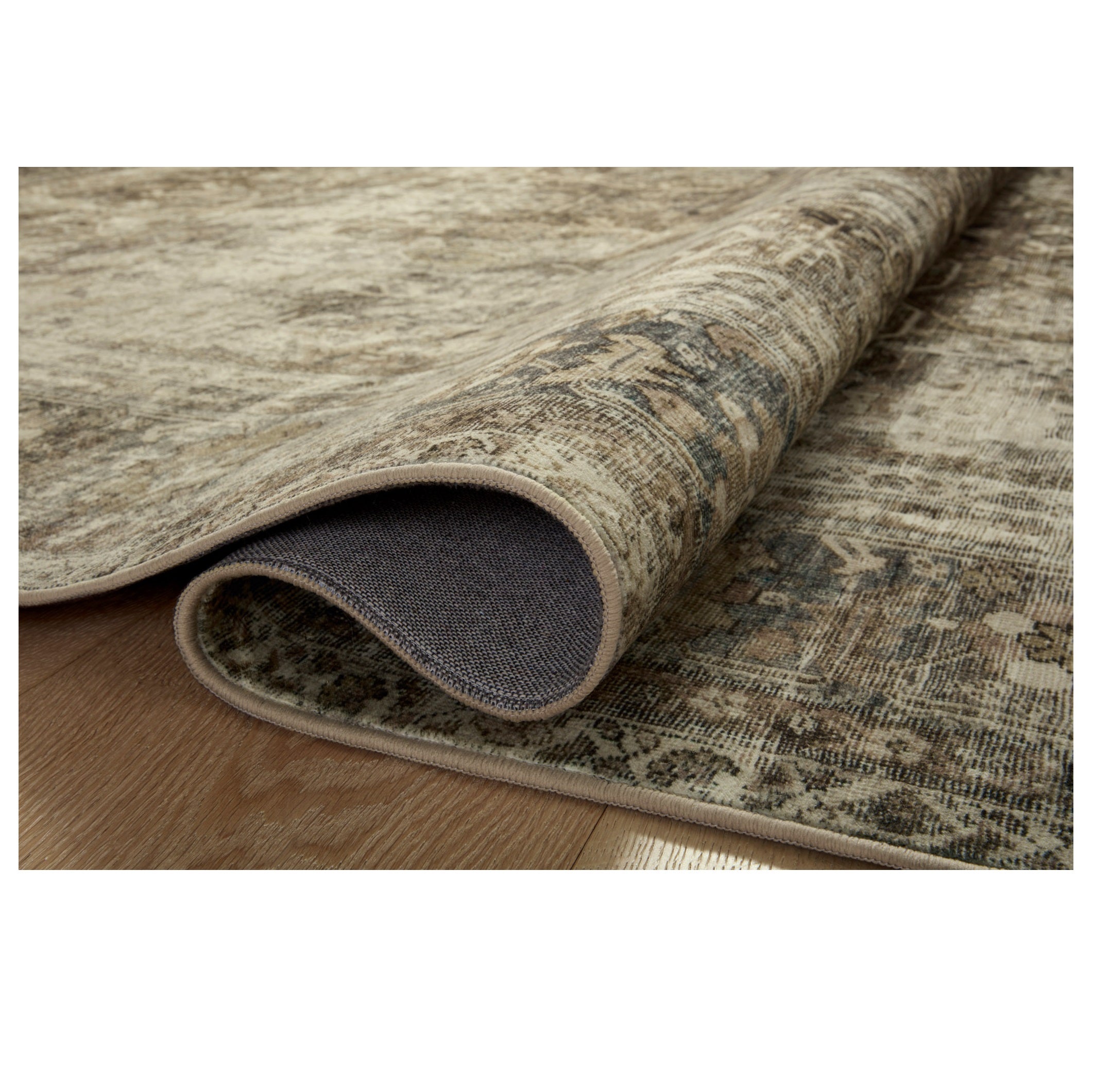 Sinclair Pebble Taupe Rug rolled 