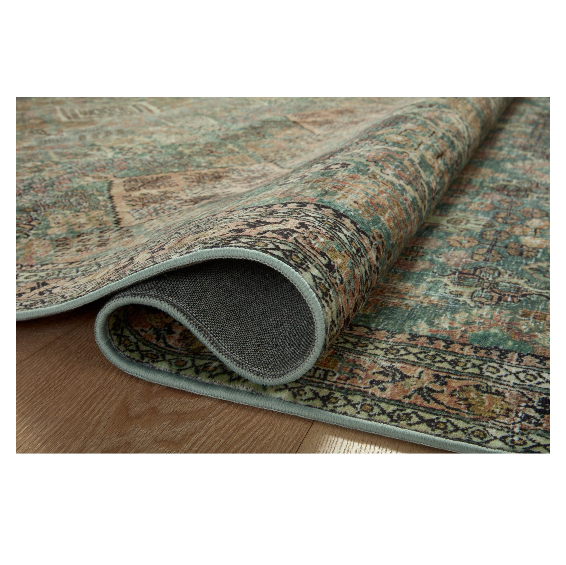 Sinclair Turquoise Multi Rug rolled