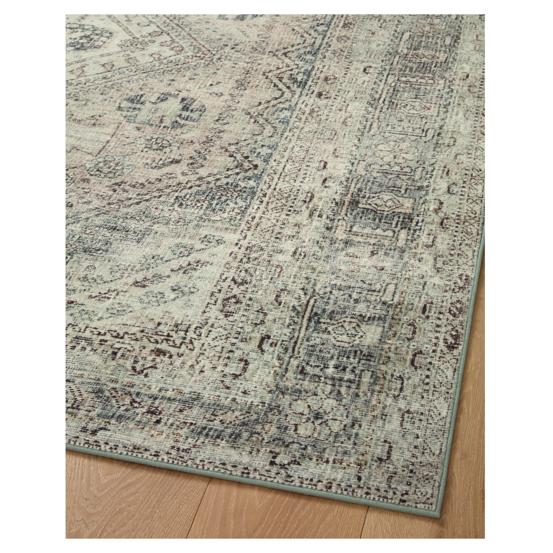 Sinclair Natural Sage Rug corner on wood floor 