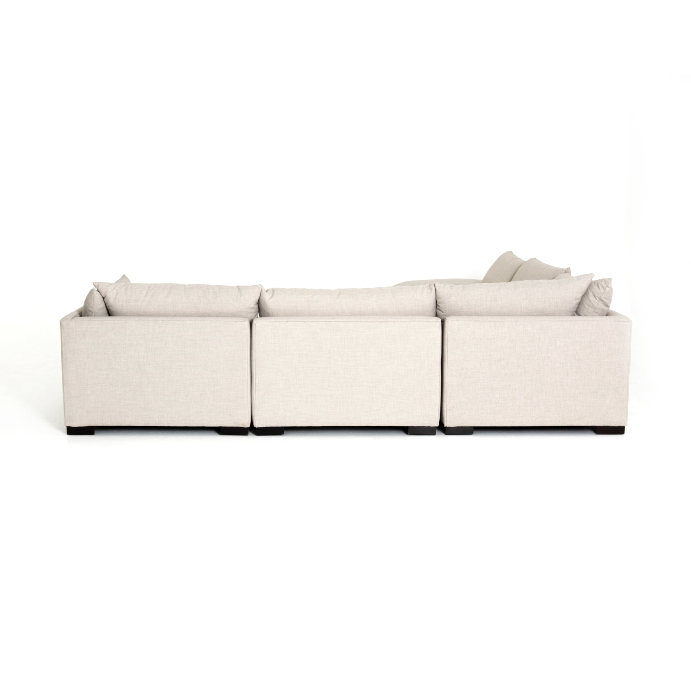 cream fabric L-shaped sectional sofa with ottoman for Magnoliass