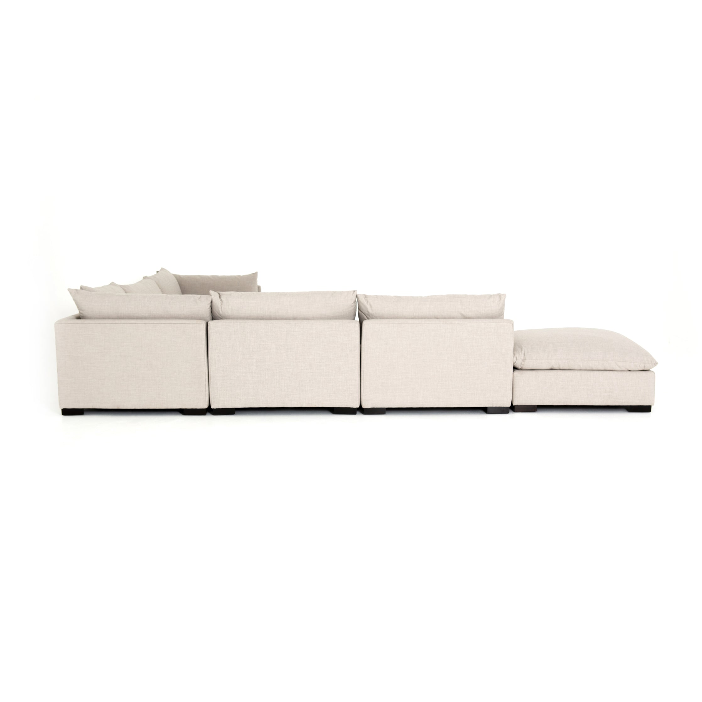 cream fabric L-shaped sectional sofa with ottoman for Magnoliass