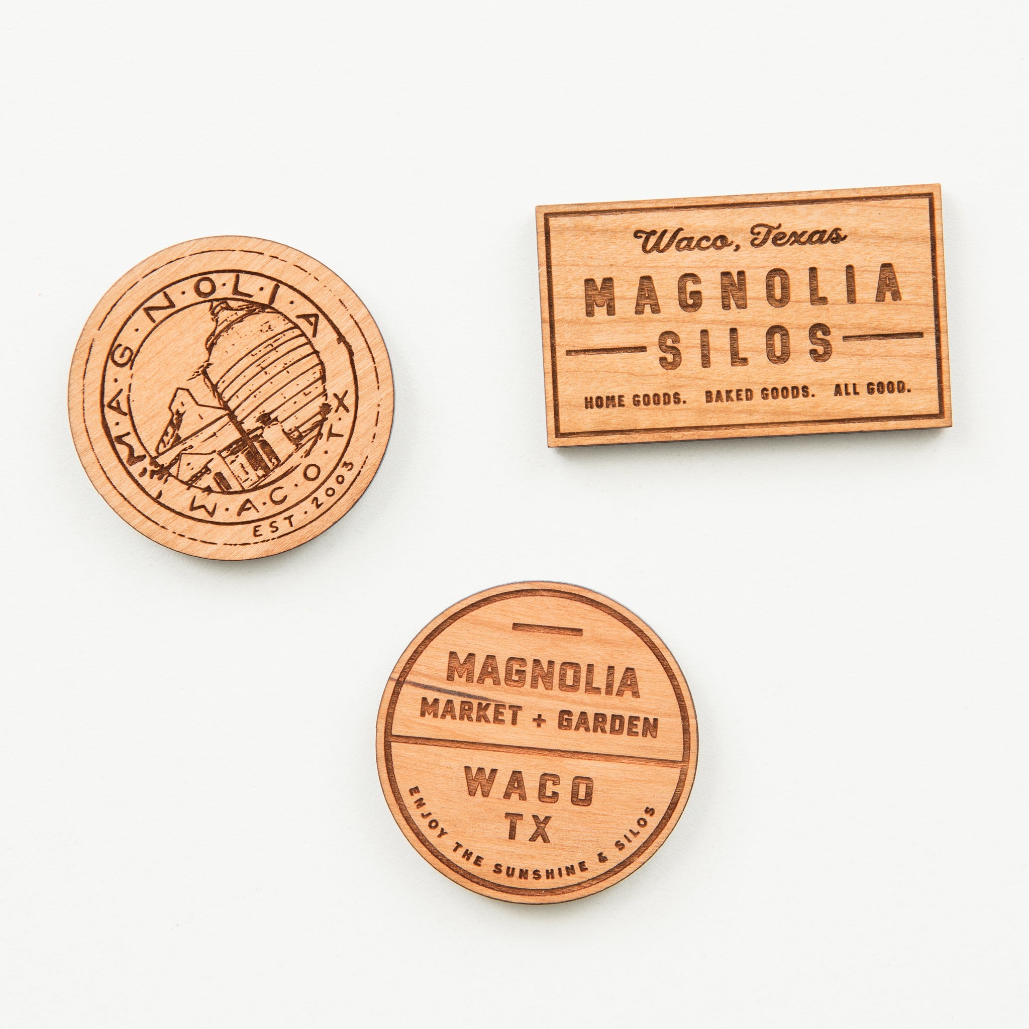 laser engraved wooden magnet with Magnoliass silos mural logo