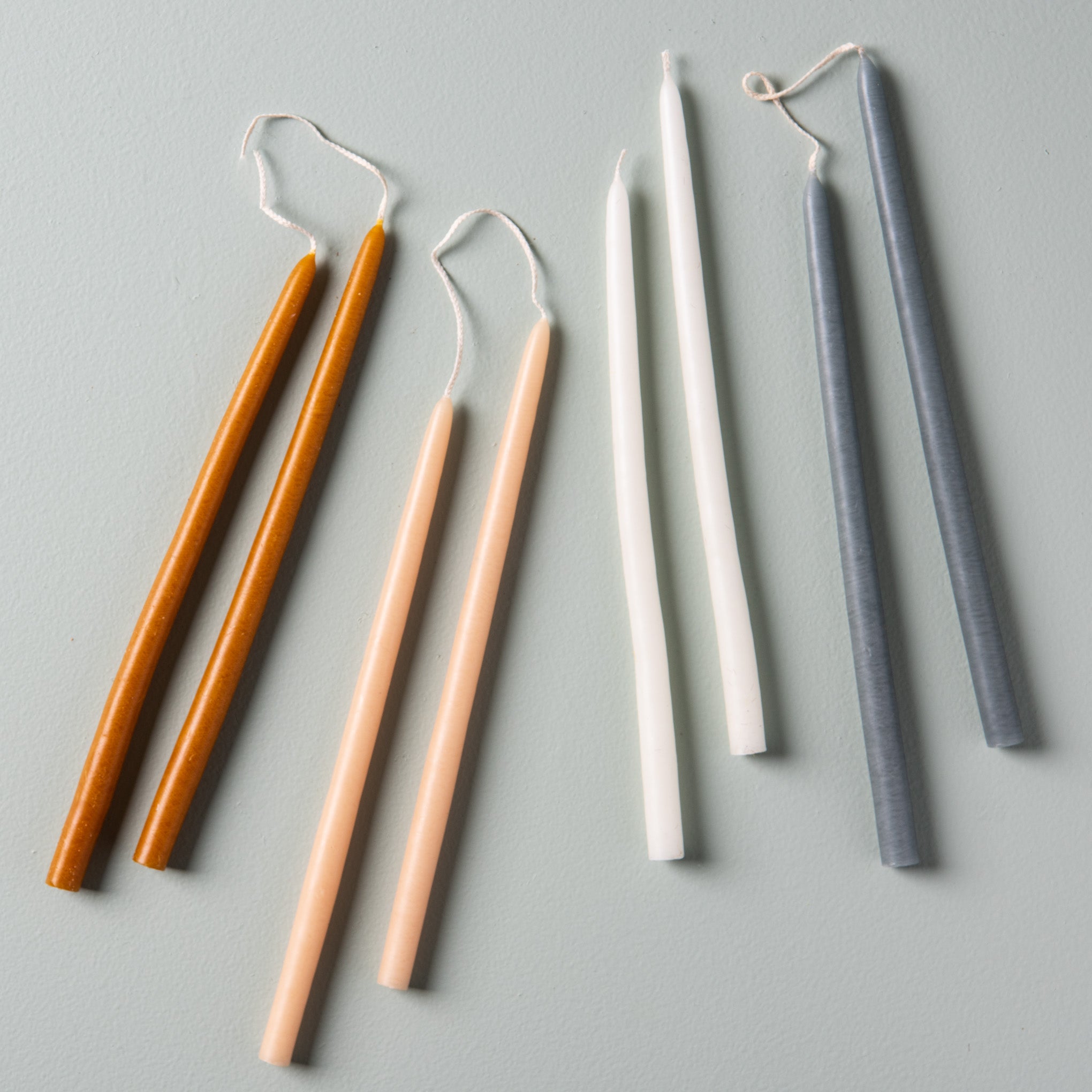 10" handmade skinny taper candles in various colors