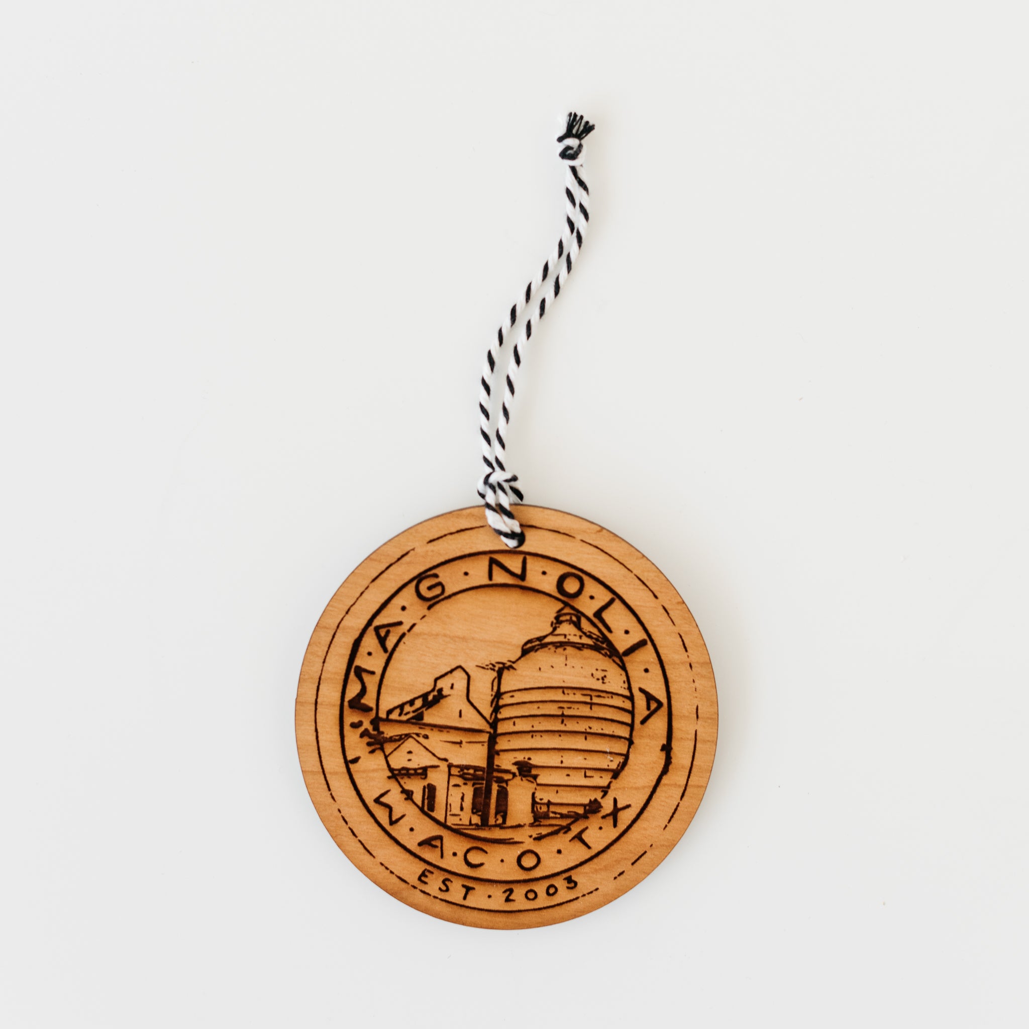 wooden laser-engraved christmas ornament of the Magnoliass silos seal