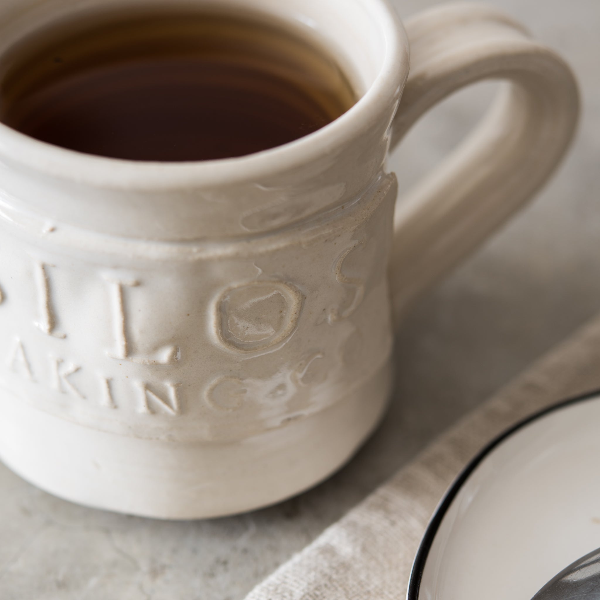 hand thrown coffee mug with silos baking co logo