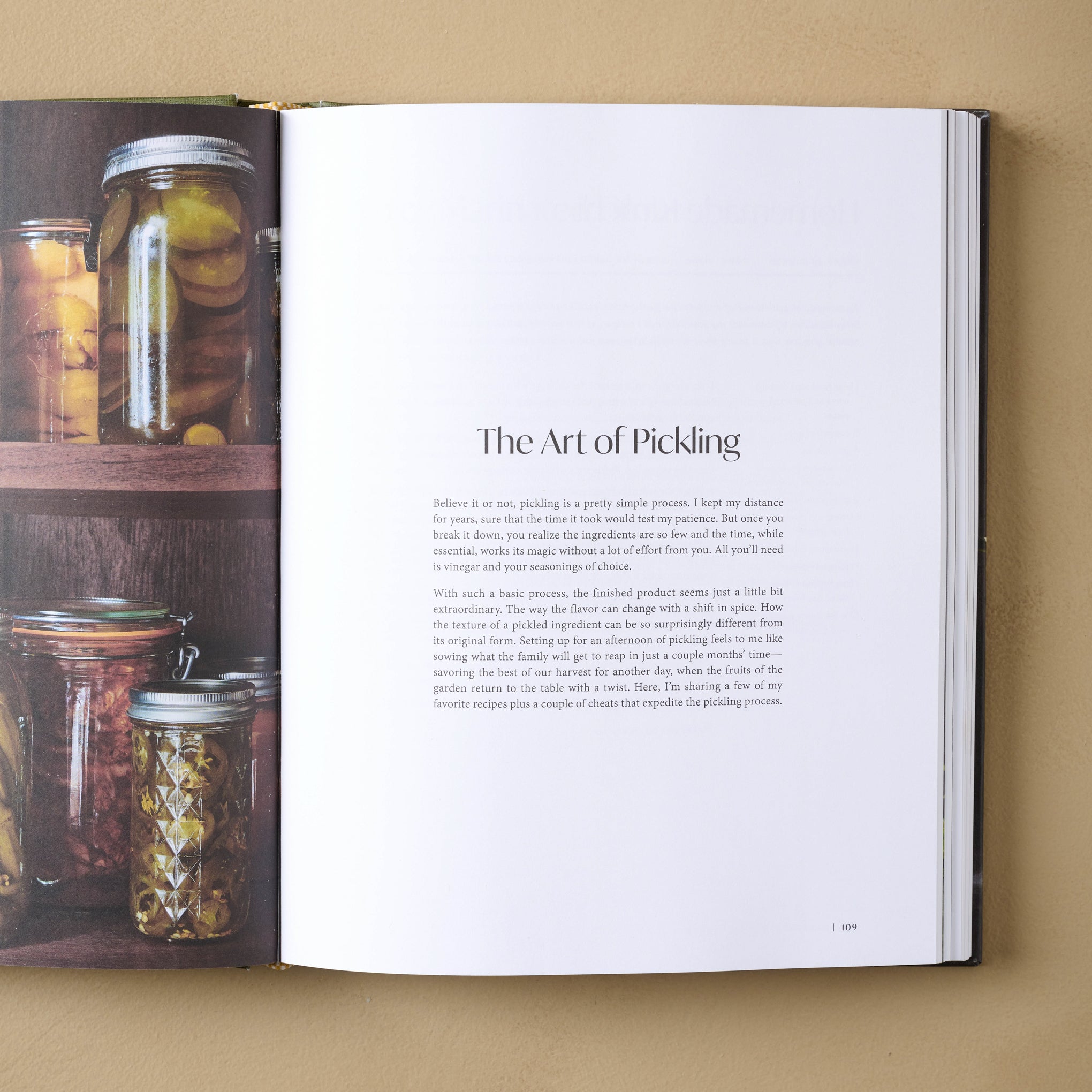 Joanna Gaines Magnoliass Table Cookbook Volume 3 open to a page titled the art of pickling