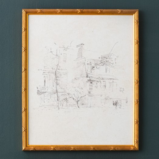 framed distressed sketch of old houses in gold frame